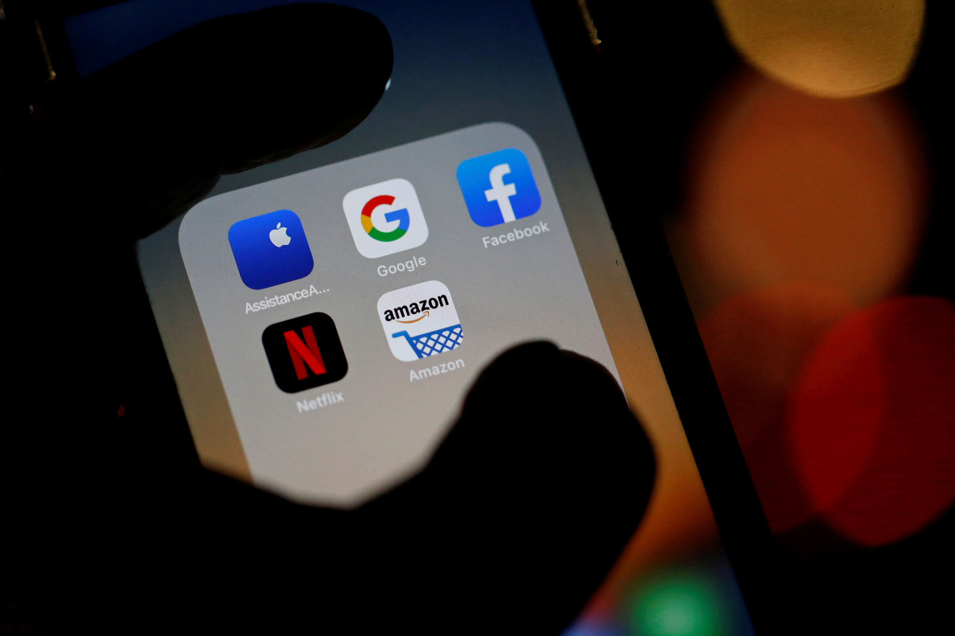 <p>The logos of mobile apps, Google, Amazon, Facebook, Apple and Netflix, are displayed on a screen in this illustration picture taken December 3, 2019.</p>
