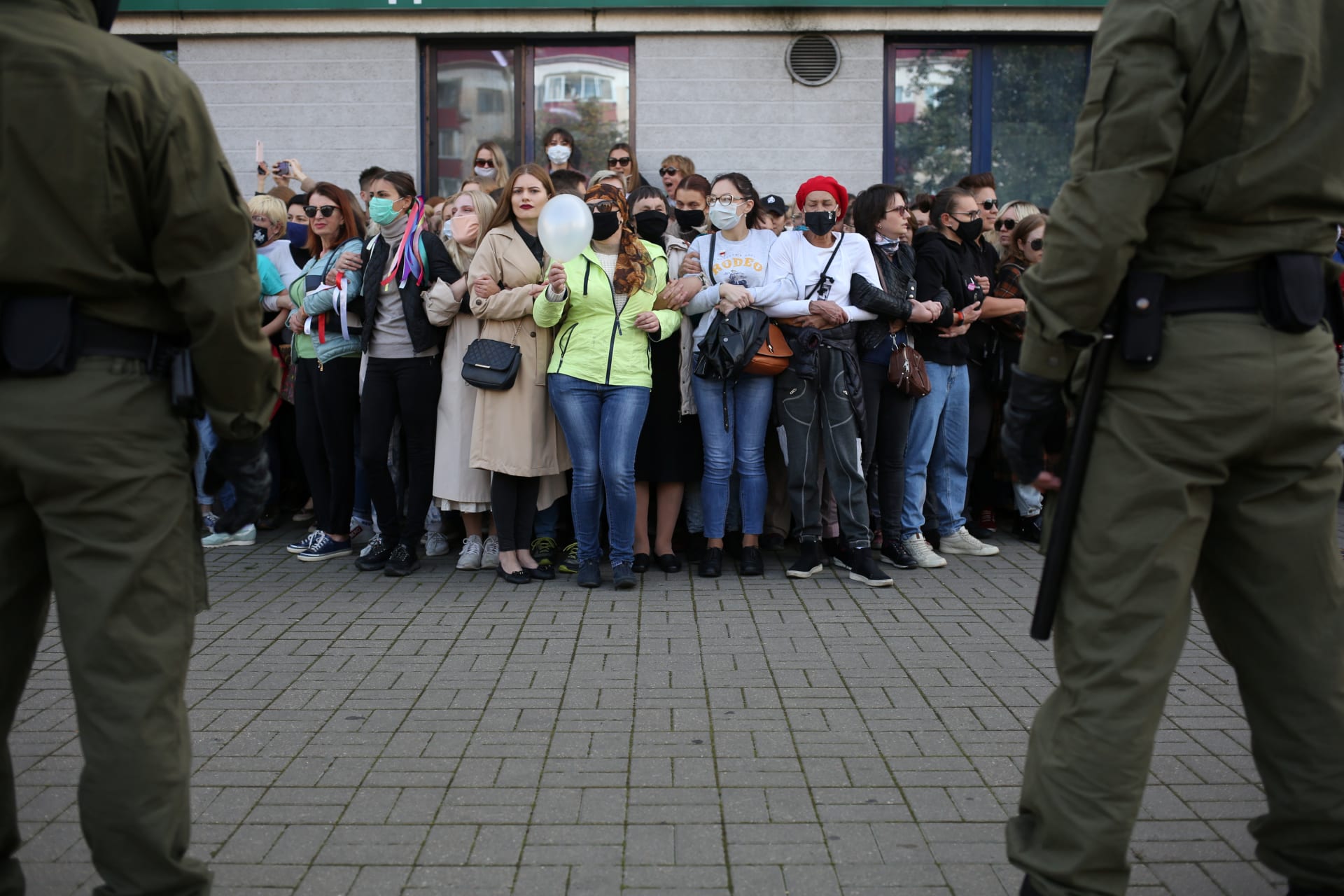 <p>Women surrounded by Belarusian law enforcement officers during an opposition rally to protest the presidential election results in Minsk, Belarus. September 19, 2020.</p>
