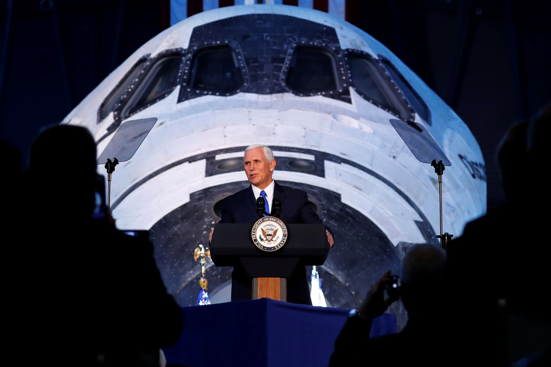 <p>Vice President Mike Pence in front of the Space Shuttle Discovery.</p>
