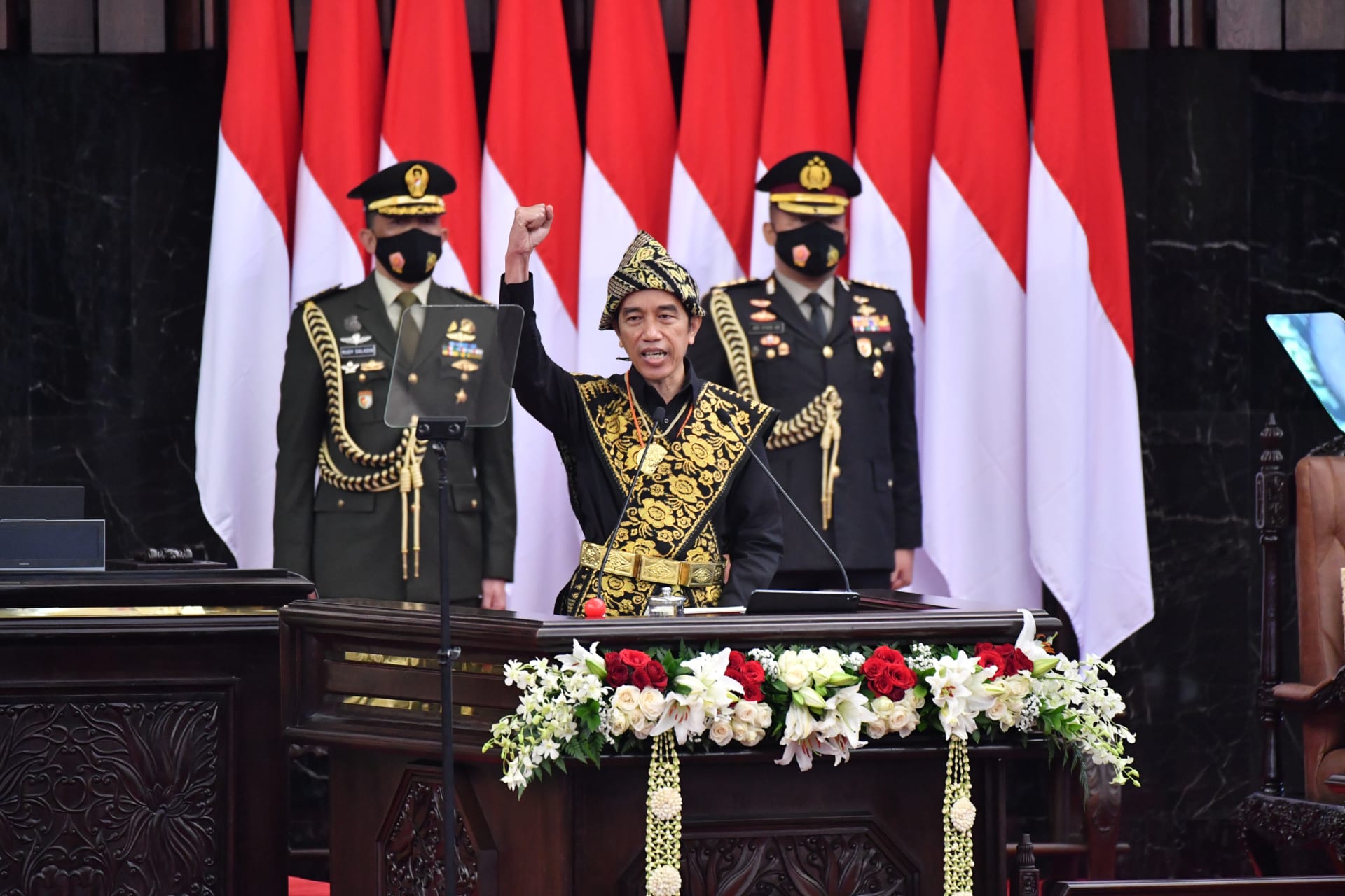 <p>Indonesian President Joko Widodo gestures as he delivers a speech ahead of the 75th Independence Day, at the parliament building in Jakarta, Indonesia, on August, 14, 2020. </p>
