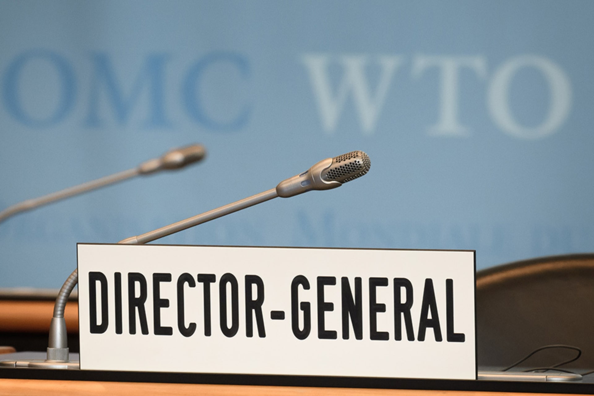 <p>A picture taken on July 23, 2020 shows the empty seat and desk of the World Trade Organization (WTO) director-general prior to a general council in Geneva. </p>
