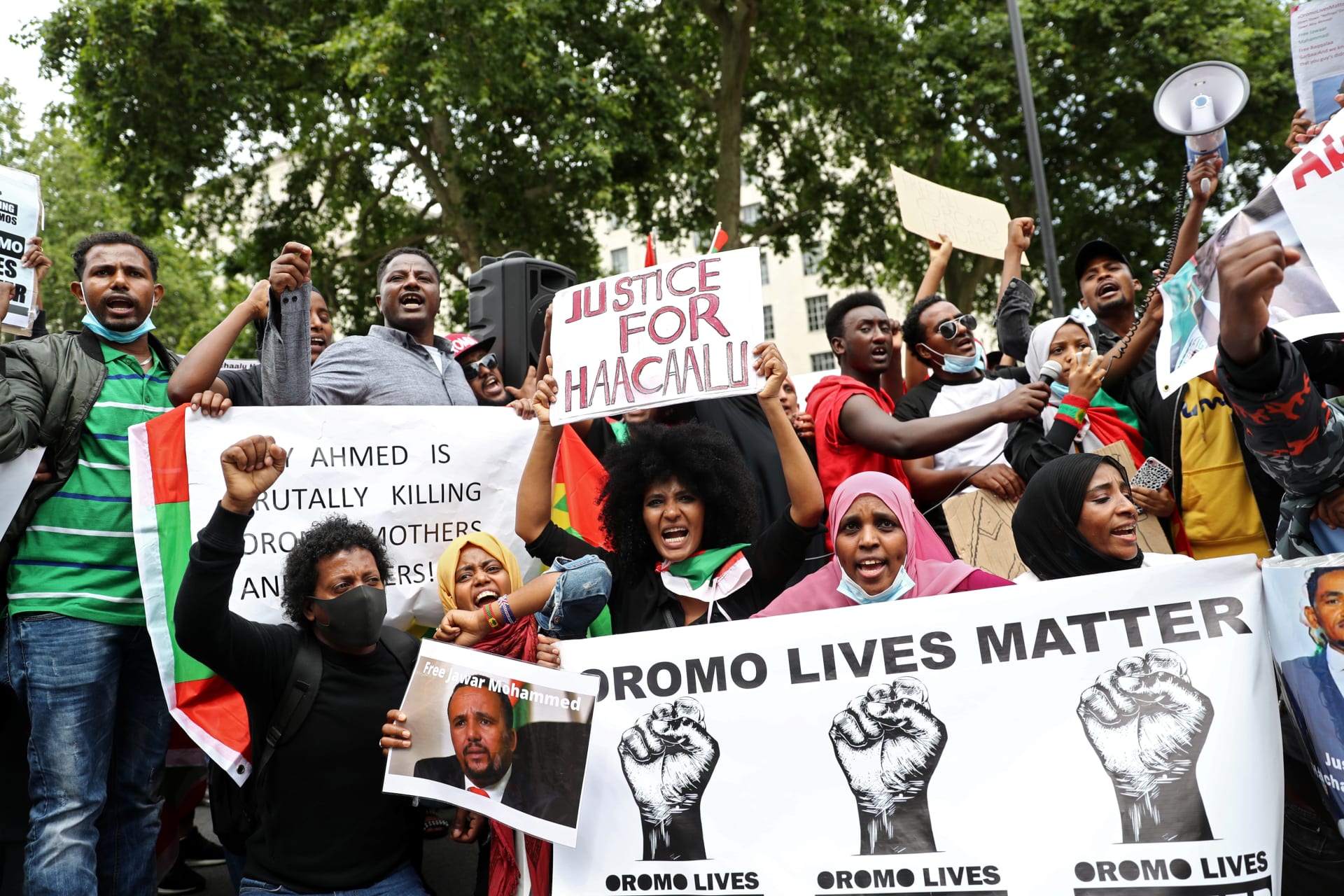 <p>People gather to protest against the treatment of Ethiopia’s ethnic Oromo group.</p>
