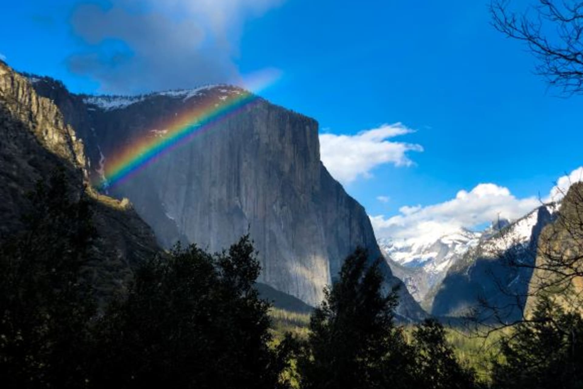 <p>A rainbow is seen across the Yosemite Valley in front of El Capitan granite rock formation in Yosemite National Park in California, on March 29, 2019. </p>
