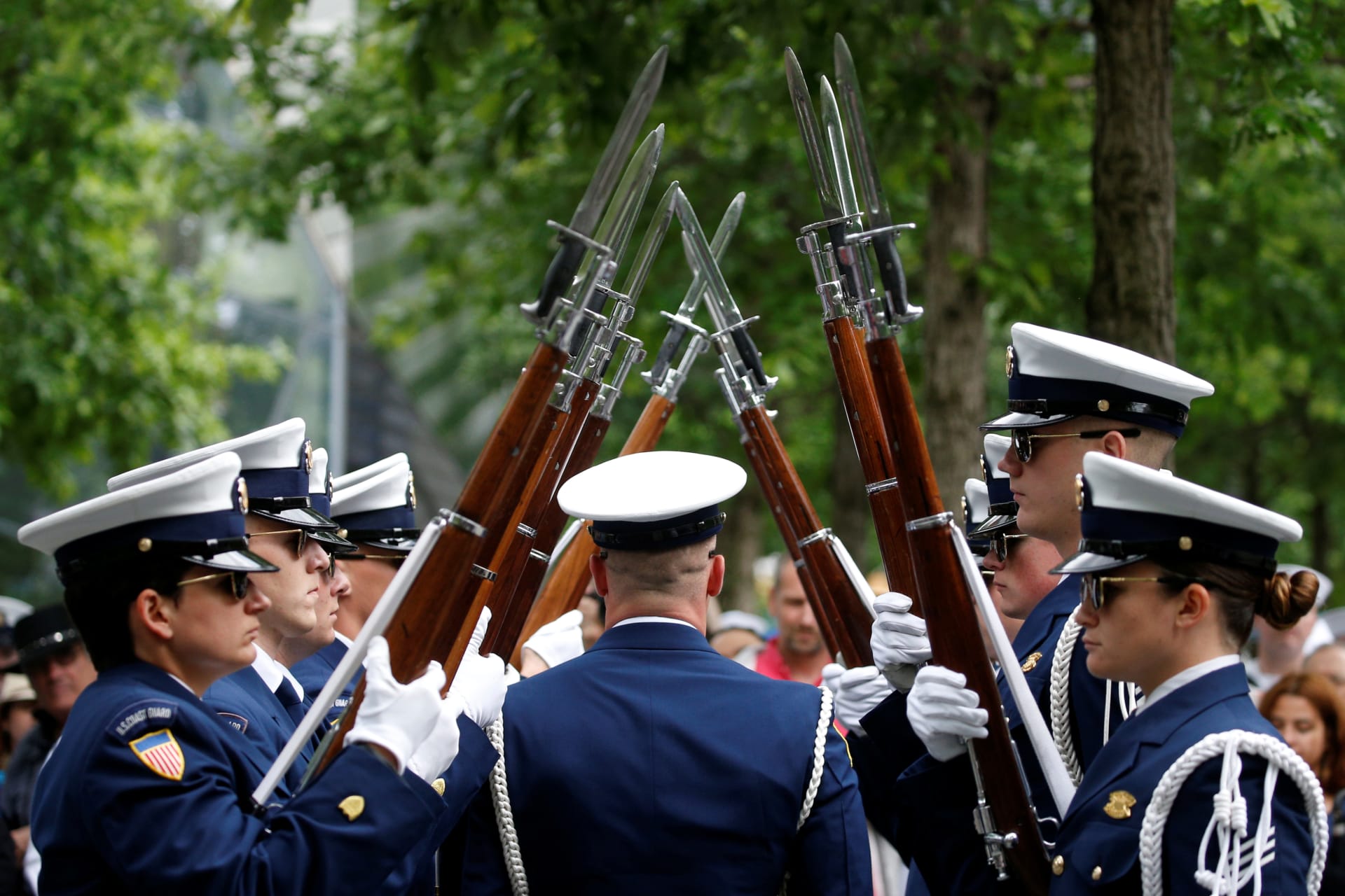 <p>Coast Guard Honor Guard members stand at attention during a ceremony in New York City in May 2017. Brendan McDermid/REUTERS</p>
