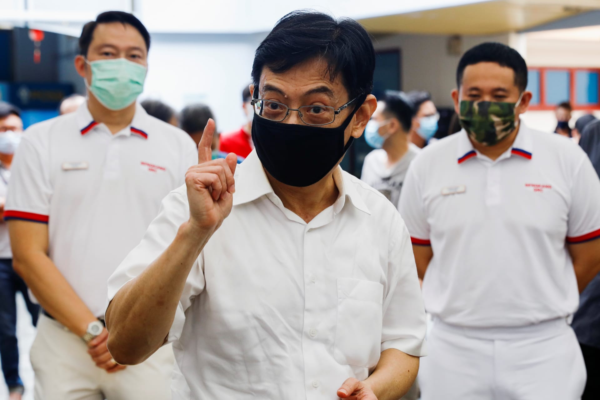 <p>Heng Swee Keat of the People’s Action Party meets residents during a walkabout ahead of the general election in Singapore on June 28, 2020.</p>
