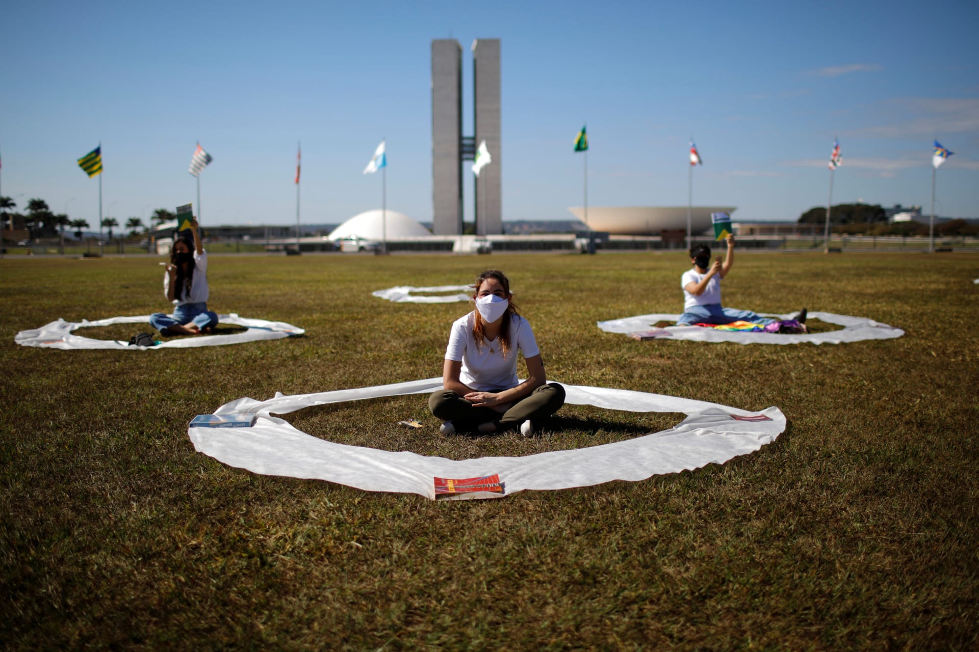 <p>Demonstrators take part in a protest against Brazil’s President Jair Bolsonaro amid the coronavirus disease (COVID-19) outbreak, in Brasilia, Brazil, on June 13, 2020. </p>
