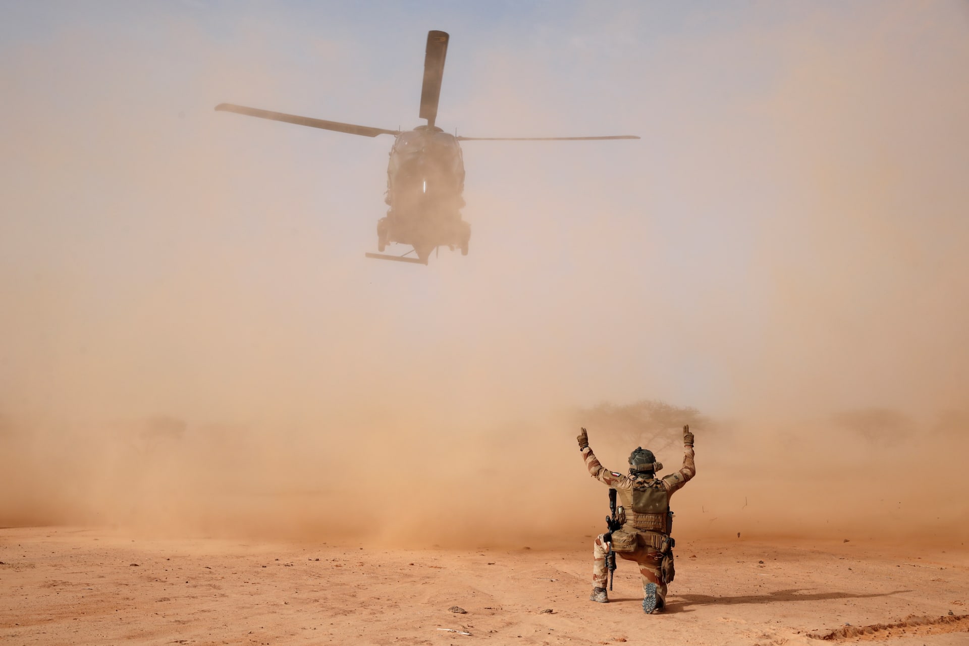 <p>An NH90 Caiman military helicopter lands next to a temporary forward operating base during Operation Barkhane in Ndaki, Mali, on July 29, 2019.</p>

