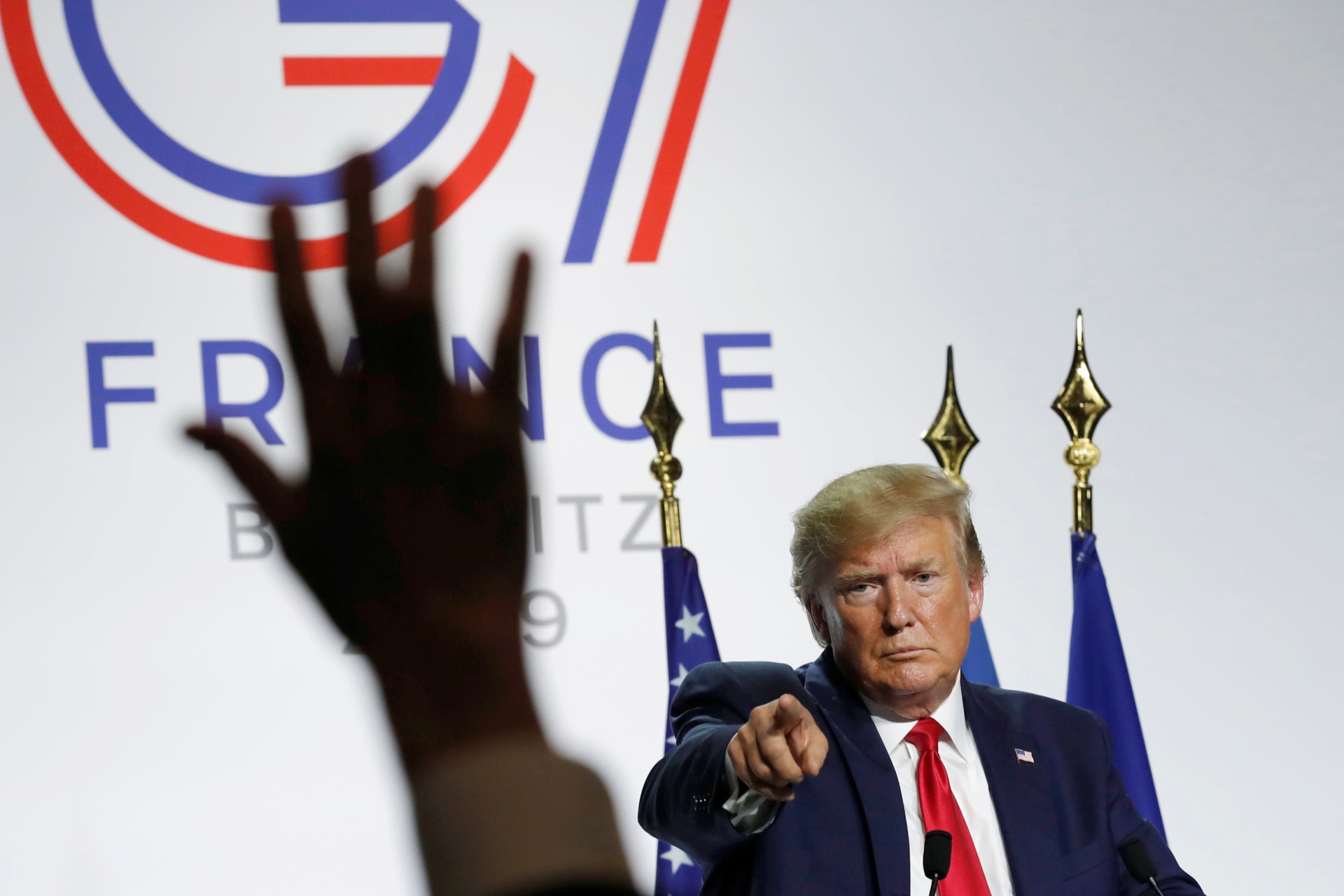 <p>U.S. President Donald J. Trump gestures during a news conference at the G7 summit in Biarritz, France, on August 26, 2019.</p>
