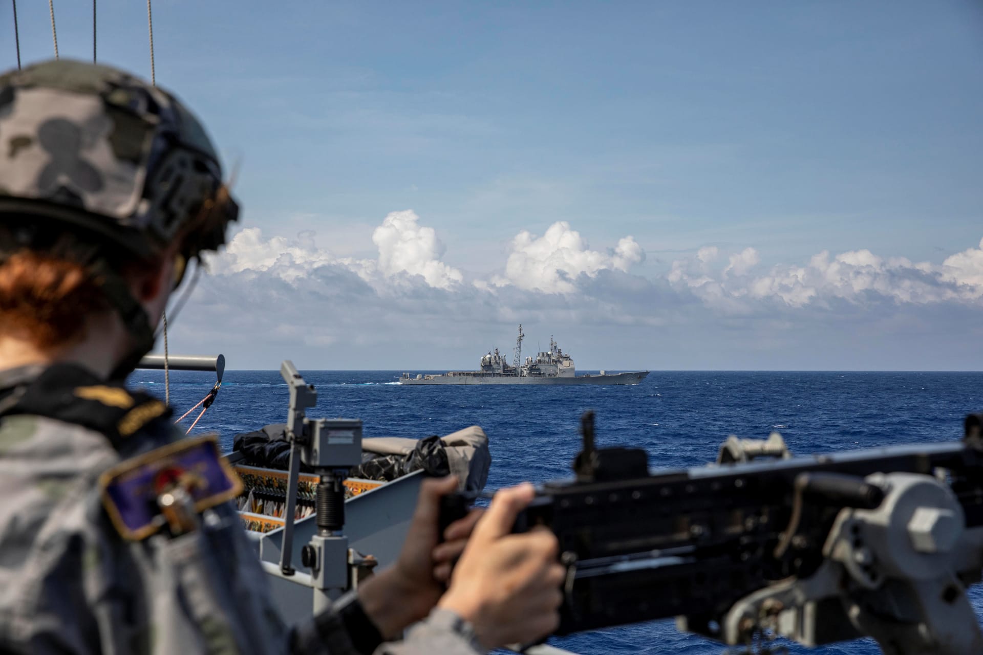 <p>The USS Bunker Hill moves into position while conducting a joint training exercise with HMAS Parramatta during a recent transit of the South China Sea on April 14, 2020. </p>
