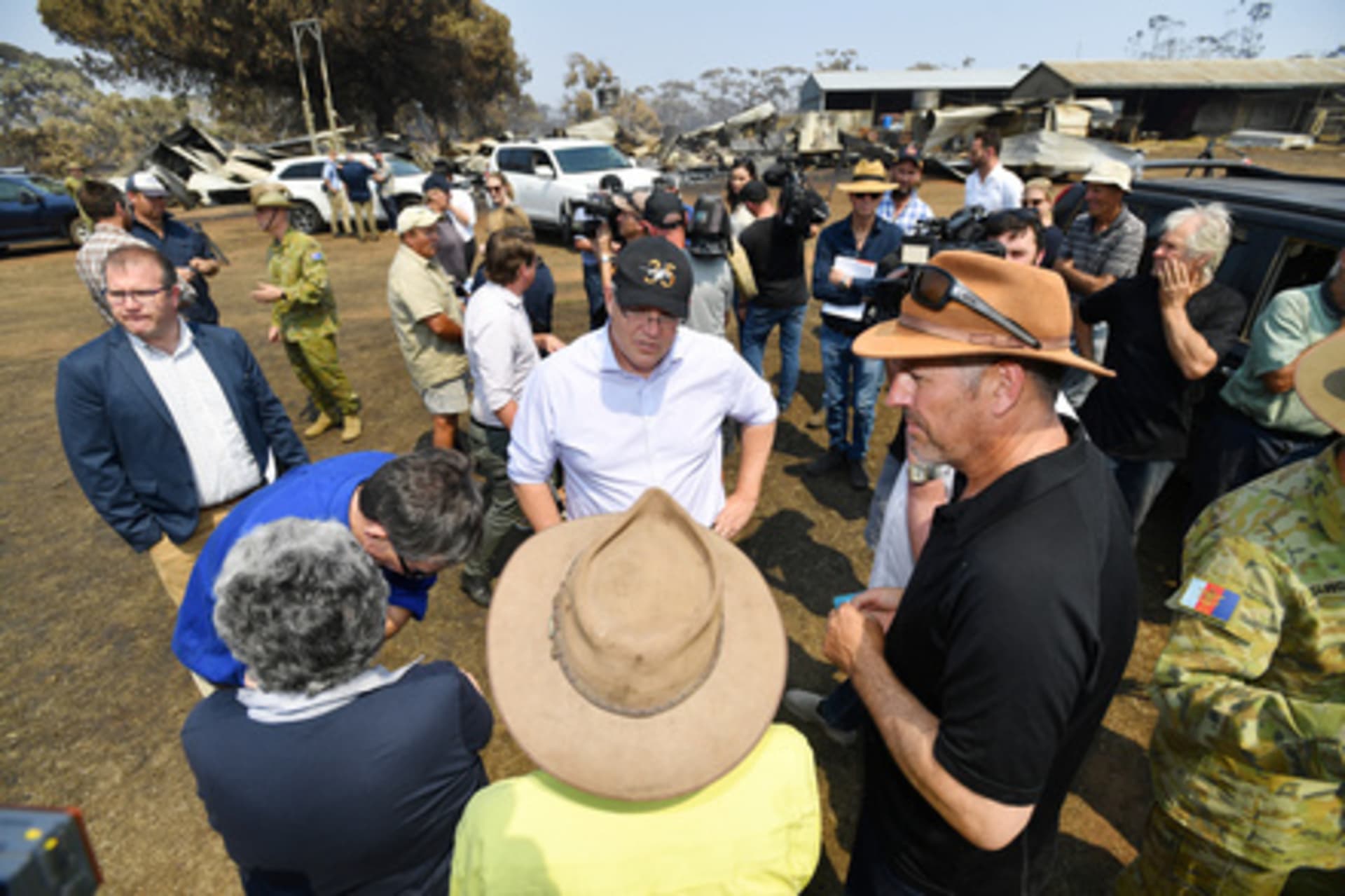 <p>Australian Prime Minister Scott Morrison is seen visiting a fire-damaged property on Stokes Bay on Kangaroo Island, southwest of Adelaide, Australia, on January 8, 2020.</p>
