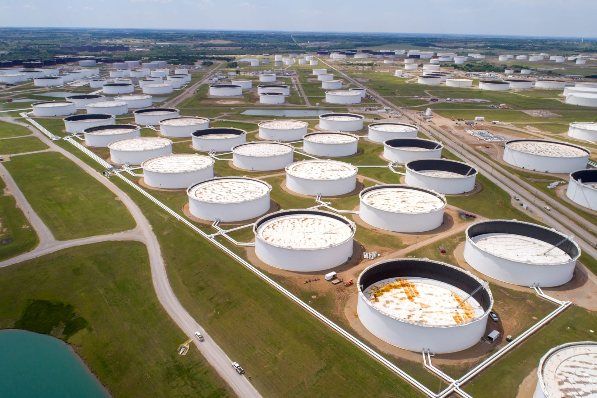 <p>Crude oil storage tanks are seen in an aerial photograph at the Cushing oil hub in Cushing, Oklahoma, U.S. April 21, 2020.</p>

