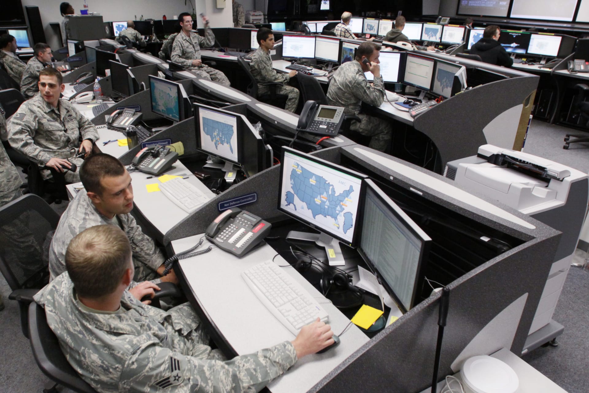 <p>Personnel work at the Air Force Space Command Network Operations & Security Center at Peterson Air Force Base in Colorado Springs.</p>
