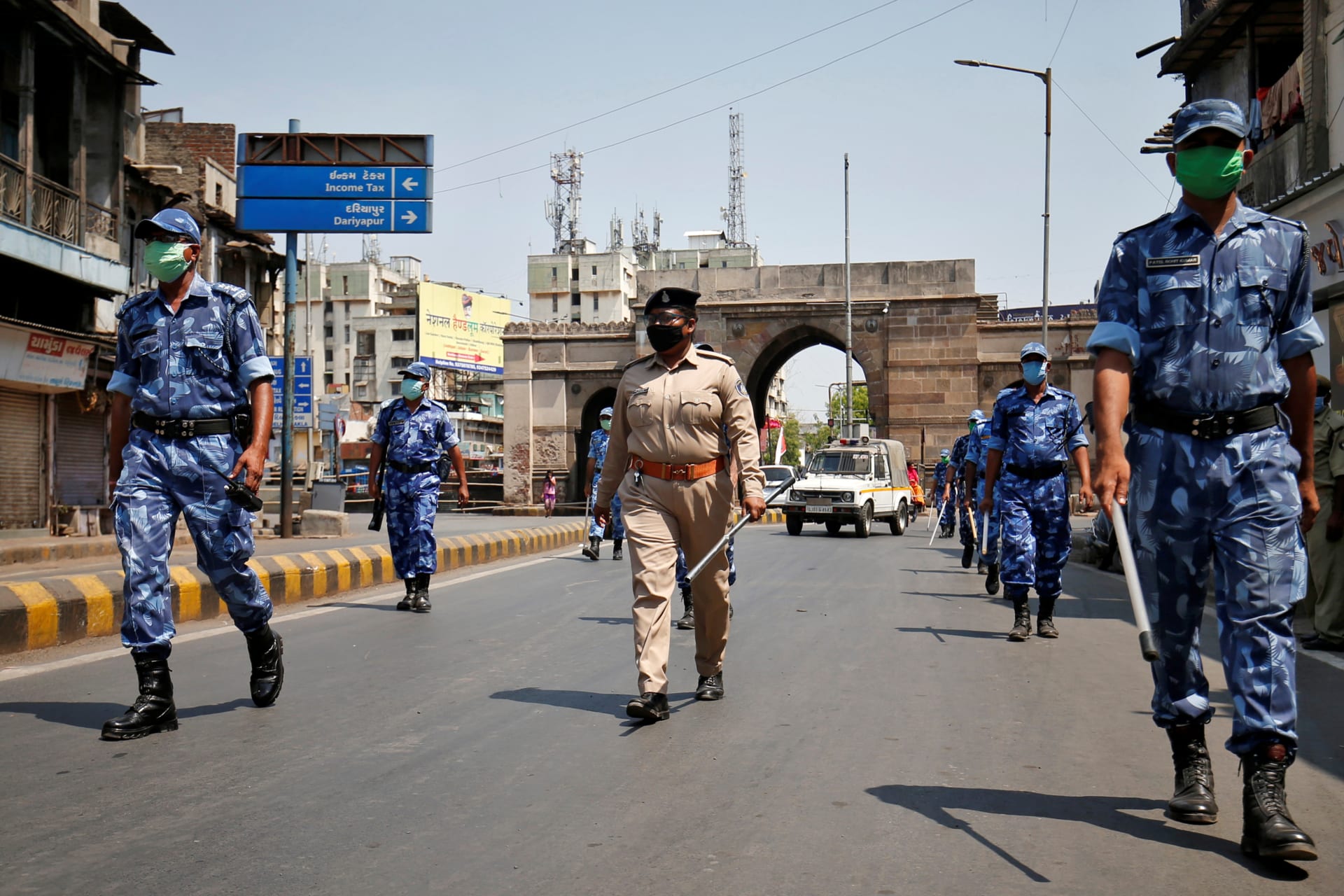 <p>Members of India’s specialized police force patrol a street in Ahmedabad during the lockdown.</p>

