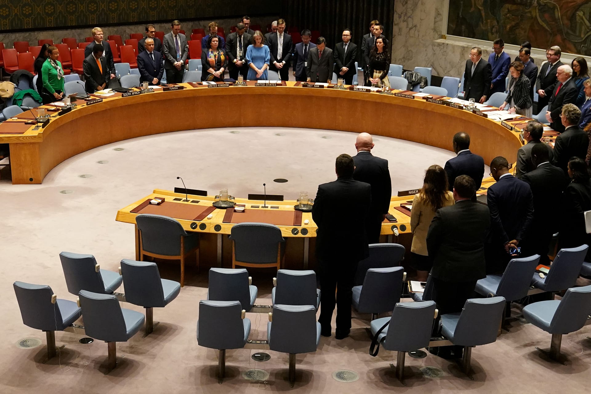 <p>Members of the United Nations Security Council observe a moment of silence at the beginning of a meeting.</p>
