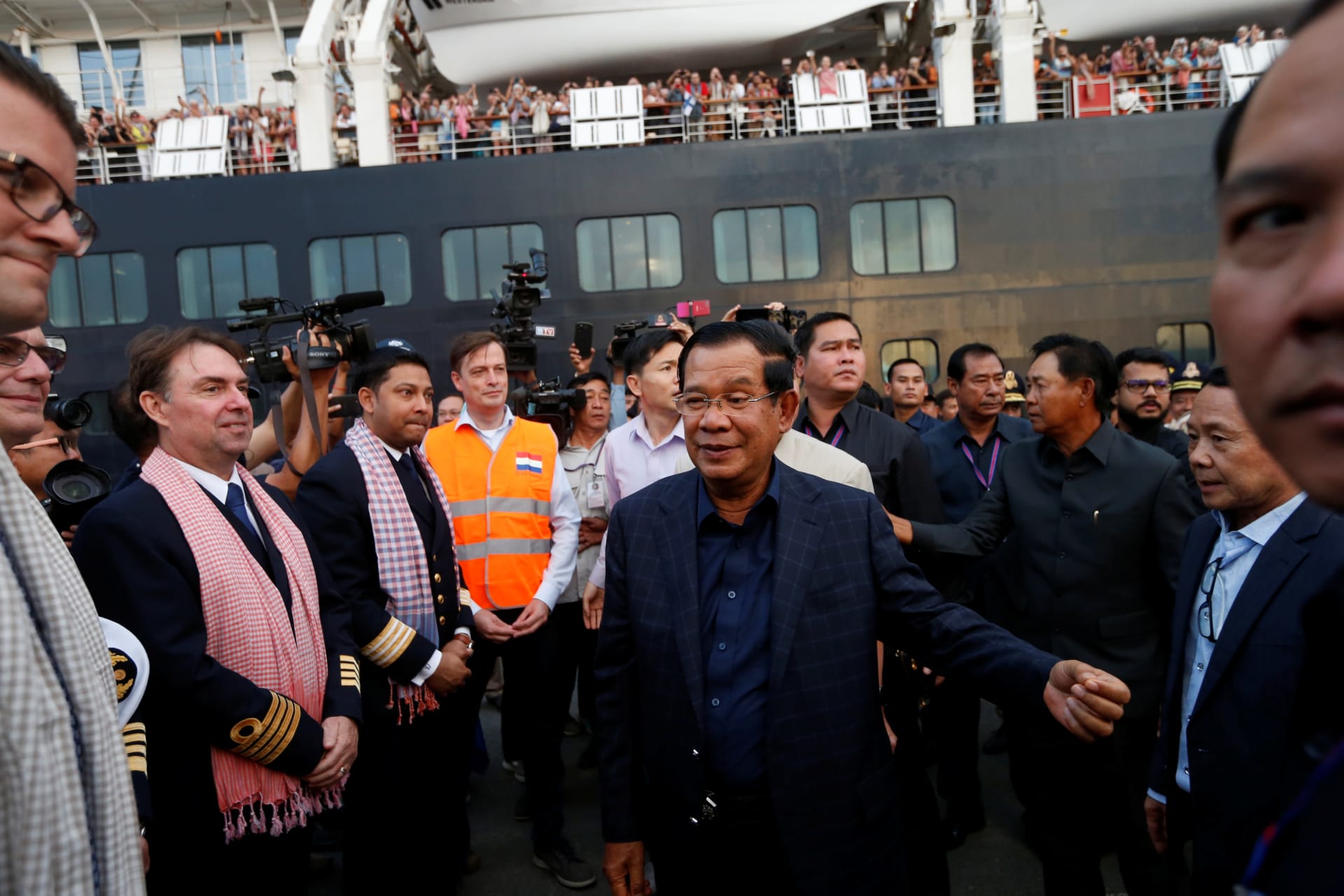 <p>Cambodia’s Prime Minister Hun Sen welcomes crews of MS Westerdam, a cruise ship that spent two weeks at sea after being turned away by five countries over fears that someone aboard might have the coronavirus, as it docks in Sihanoukville, Cambodia on Febr</p>
