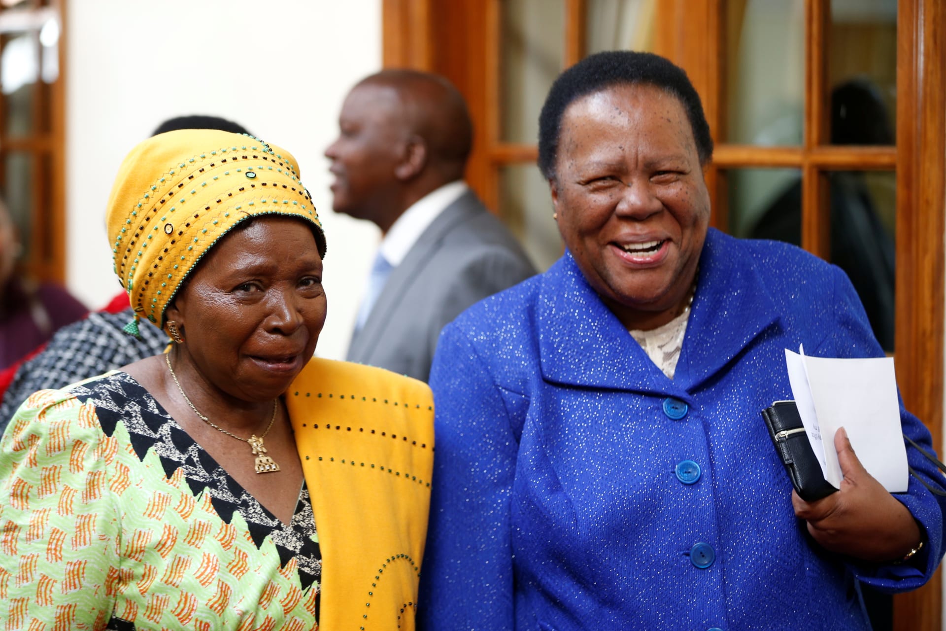 <p>Dr Nkosazana Dlamini Zuma, Minister of Cooperative Governance, talks with Dr Naledi Pandor, Minister of International Relations, ahead of a Swearing-in ceremony of South Africa’s new cabinet ministers, 2019.</p>
