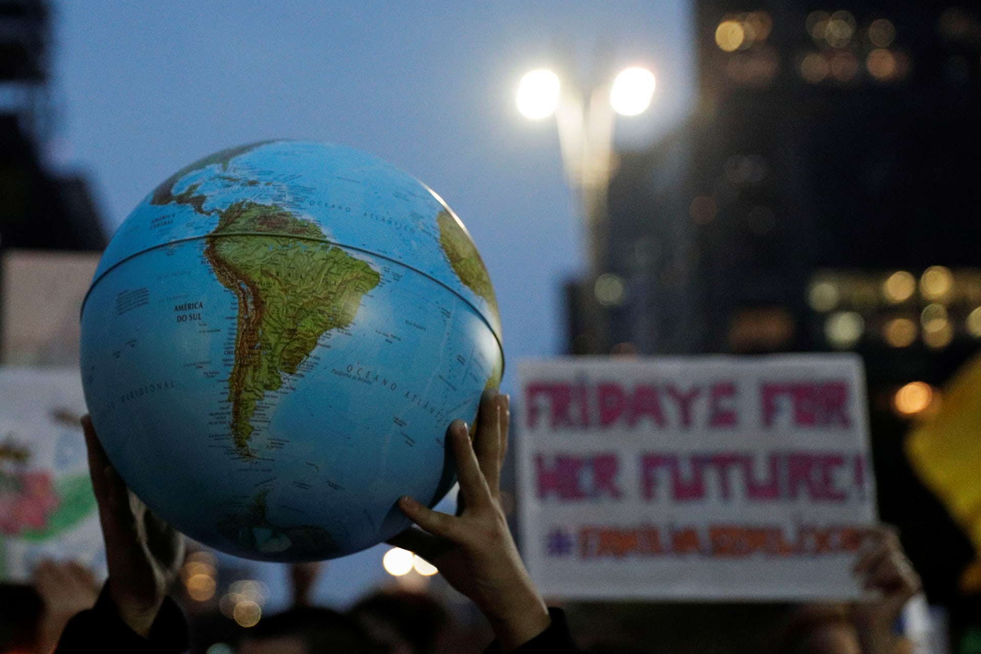 <p>A person holds a globe during the Global Climate Strike of the Fridays for Future movement in Sao Paulo, Brazil, on September 20, 2019. </p>
