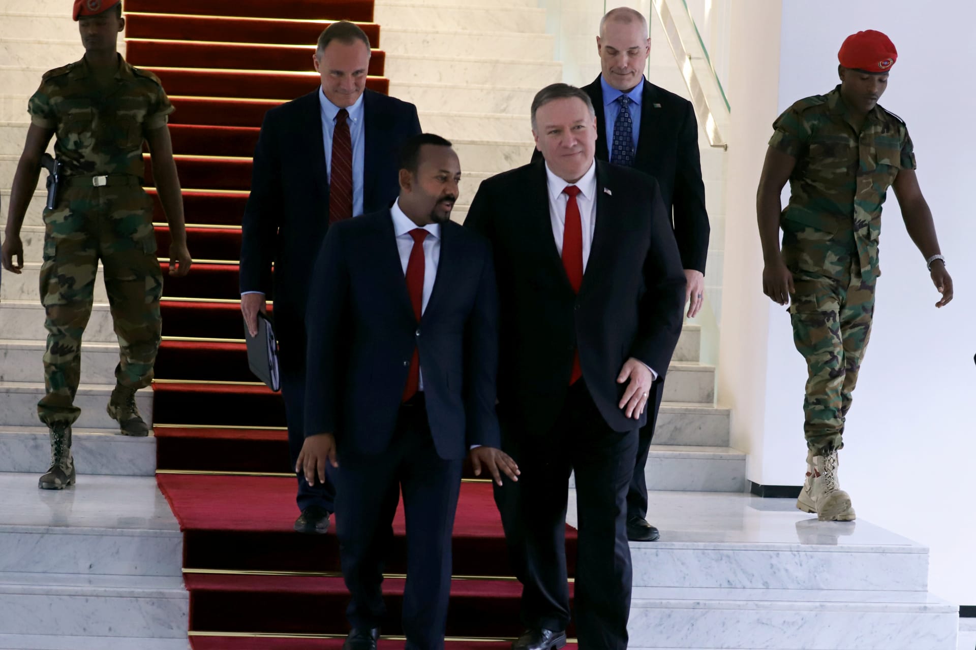 <p>U.S. Secretary of State Mike Pompeo walks with Ethiopian Prime Minister Abiy Ahmed at the Prime Minister office after a meeting in Addis Ababa, Ethiopia, on February 18, 2020.</p>
