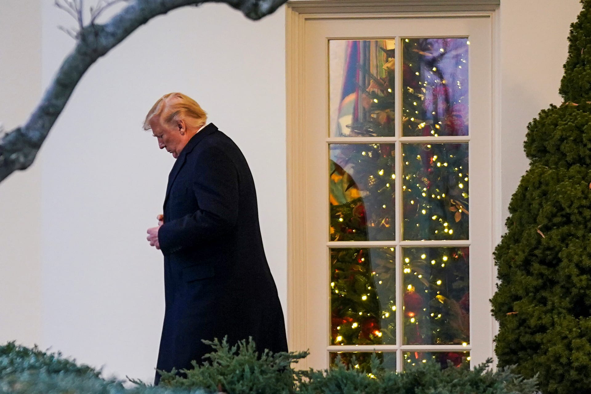 <p>U.S. President Donald Trump exits the Oval Office as he departs the White House in Washington, DC, on December 18, 2019. </p>

