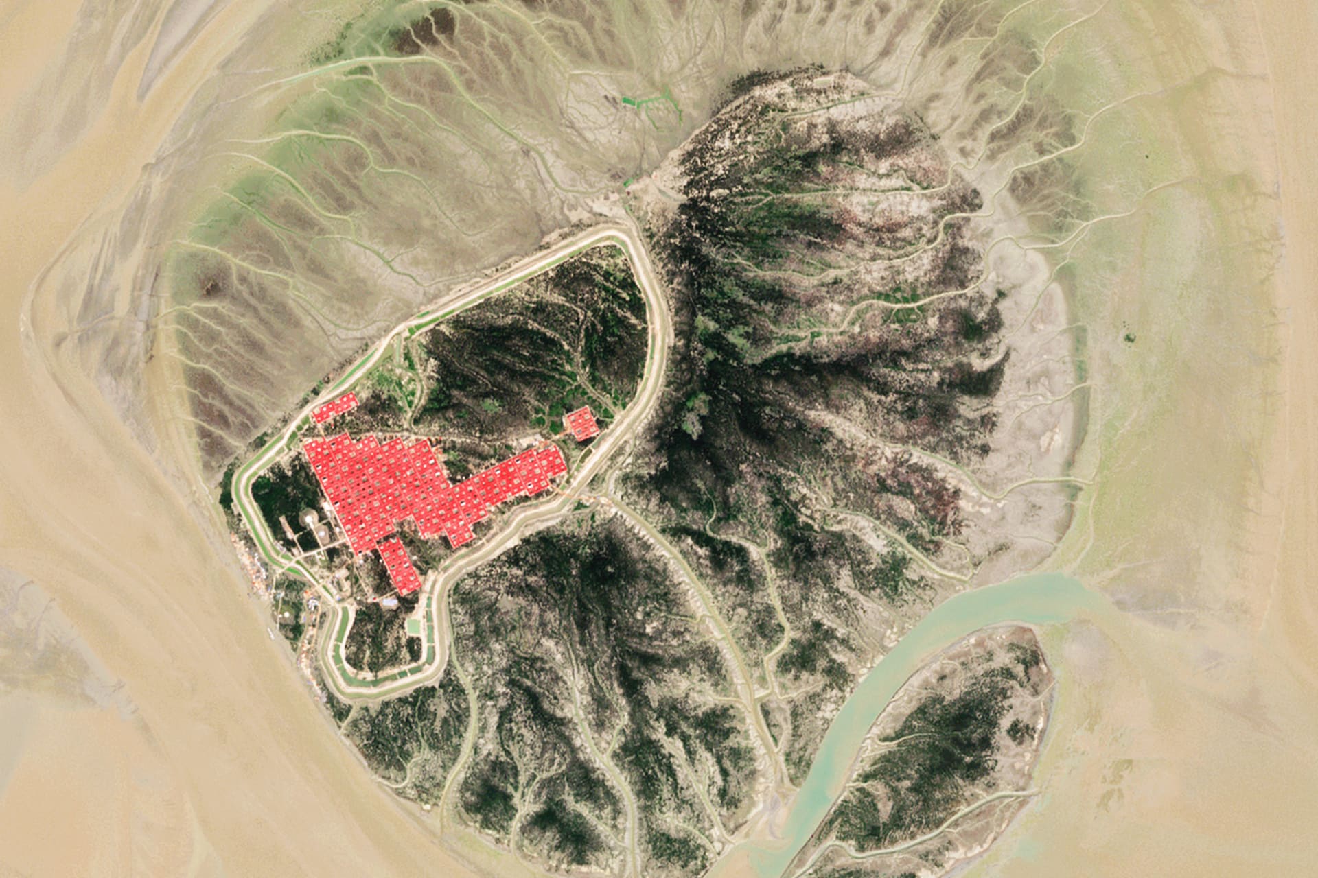 <p>The anticipated refugee settlement on Bhasan Char island, under construction in November 2018.</p>
