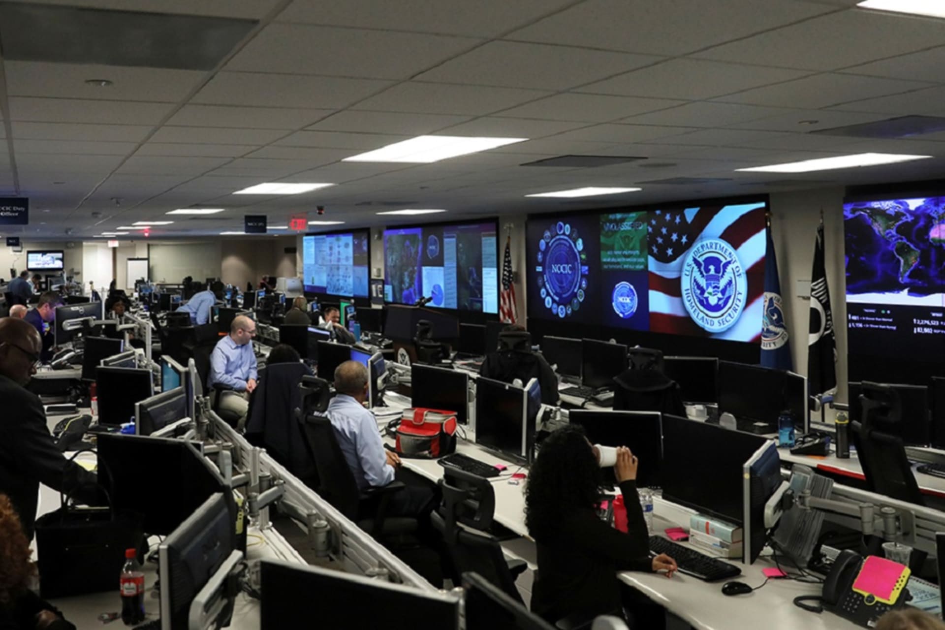 <p>U.S. Department of Homeland Security (DHS) election security workers monitor screens in the DHS National Cybersecurity and Communications Integration Center in Arlington, Virginia, on November 6, 2018. </p>
