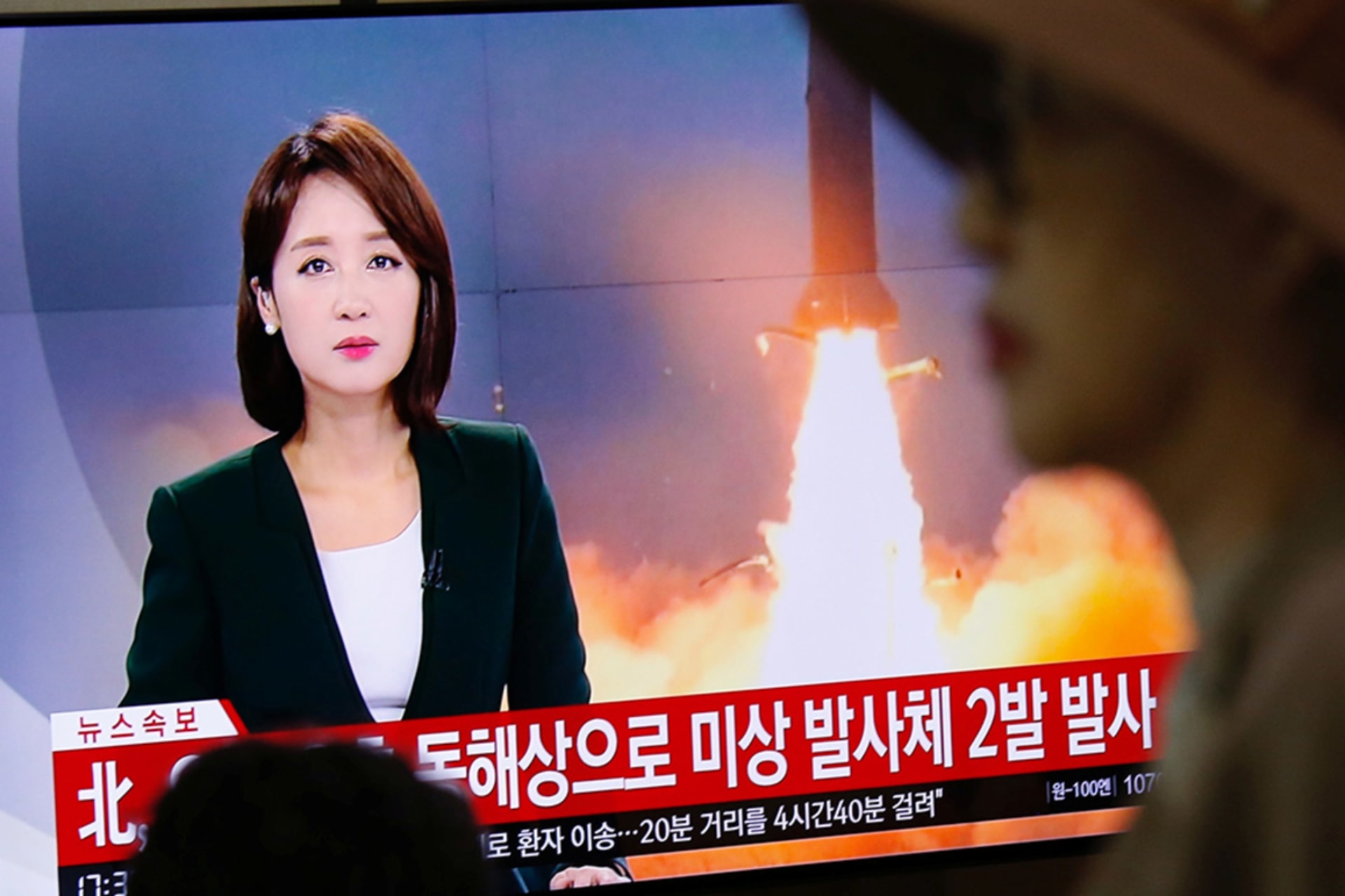 <p>People watch a TV broadcast showing file footage for a news report in Seoul, South Korea, on October 31, 2019 on North Korea firing two projectiles, possibly missiles, into the sea between the Korean Peninsula and Japan. </p>
