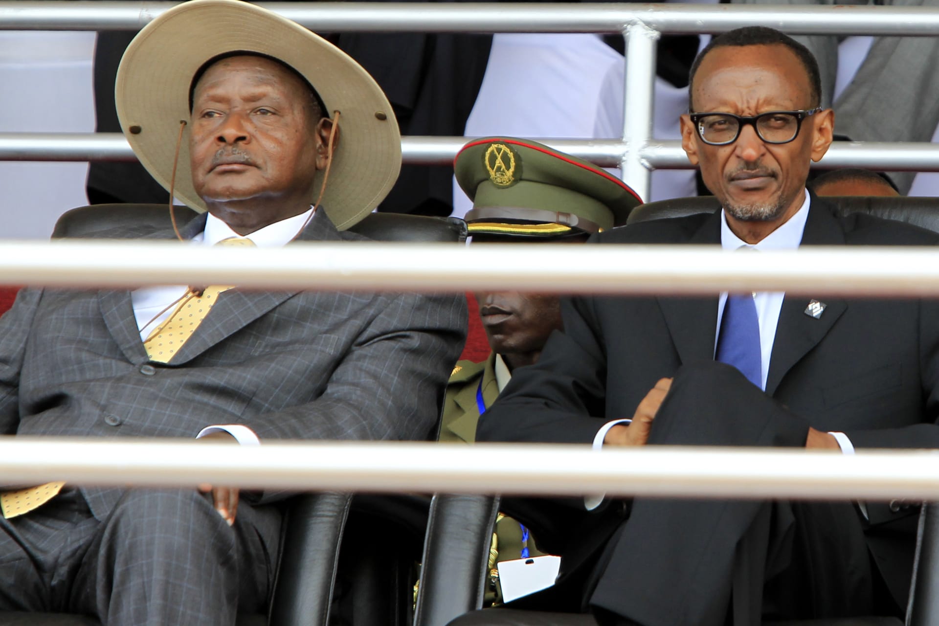 <p>Rwandan President Paul Kagame (R) and his Ugandan counterpart Yoweri Museveni follow the proceedings of the 20th anniversary commemoration of the Rwandan genocide, in Kigali, Rwanda, on April 7, 2014.</p>
