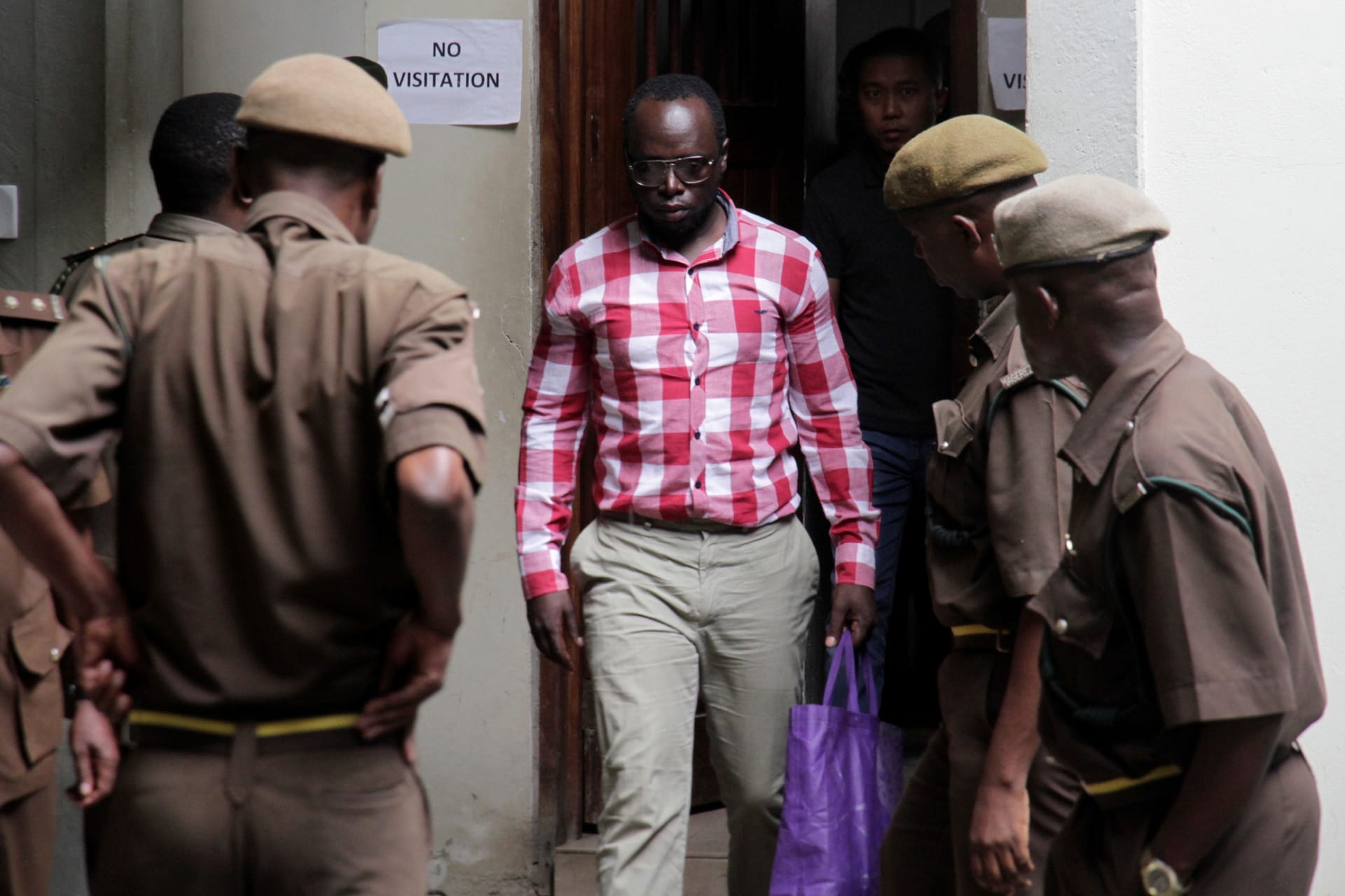 <p>Tanzanian investigative journalist Erick Kabendera arrives at the Kisutu Residents Magistrate Court in Dar es Salaam, Tanzania, on August 19, 2019. </p>
