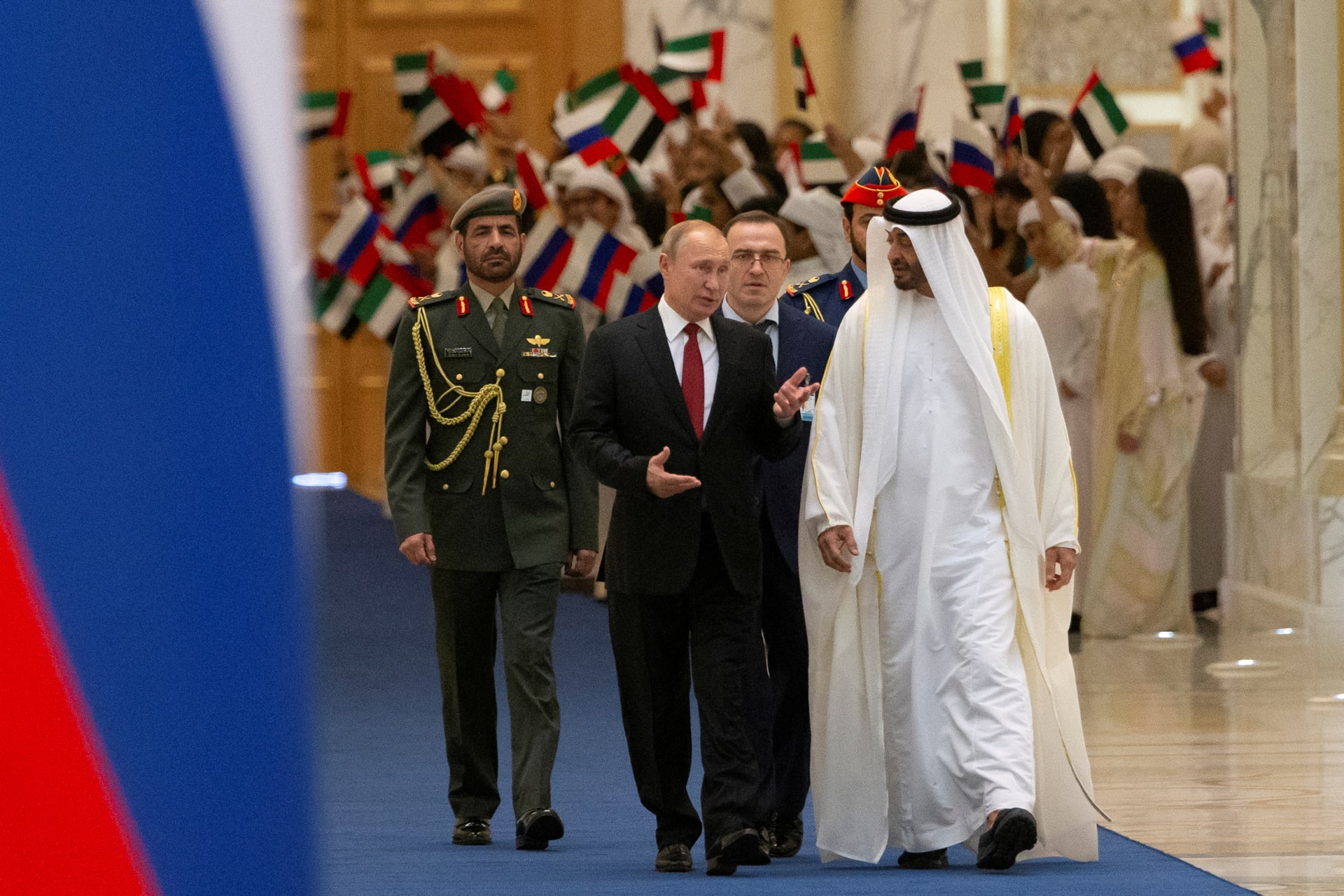 <p>Russian President Vladimir Putin and Abu Dhabi Crown Prince Mohamed bin Zayed al-Nahyan attend a welcome ceremony in the United Arab Emirates, on October 15, 2019.</p>
