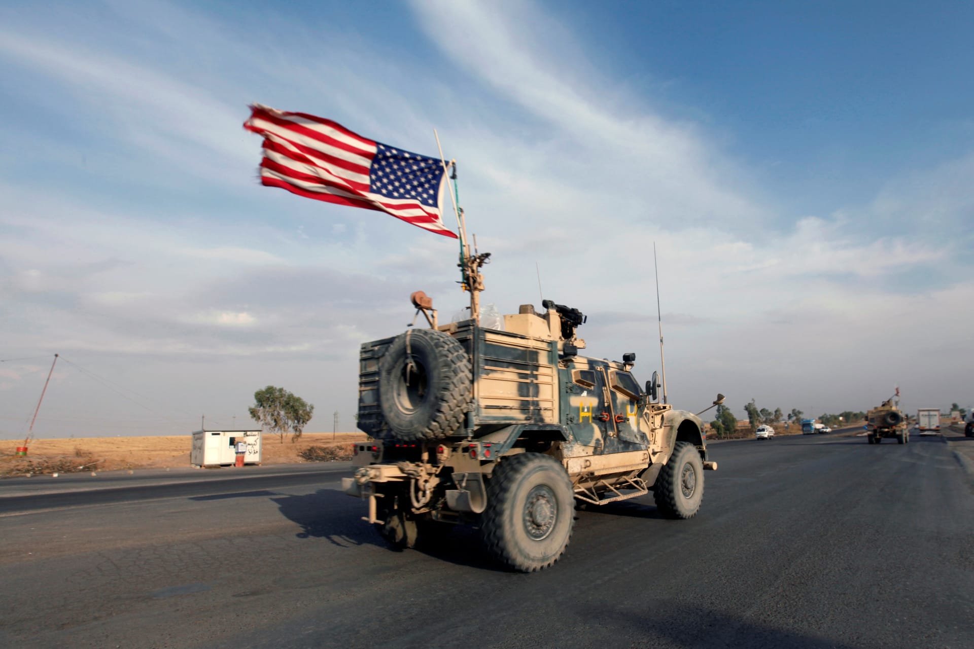 <p>A convoy of U.S. vehicles withdraws from northern Syria, in Erbil, Iraq, on October 21, 2019.</p>
