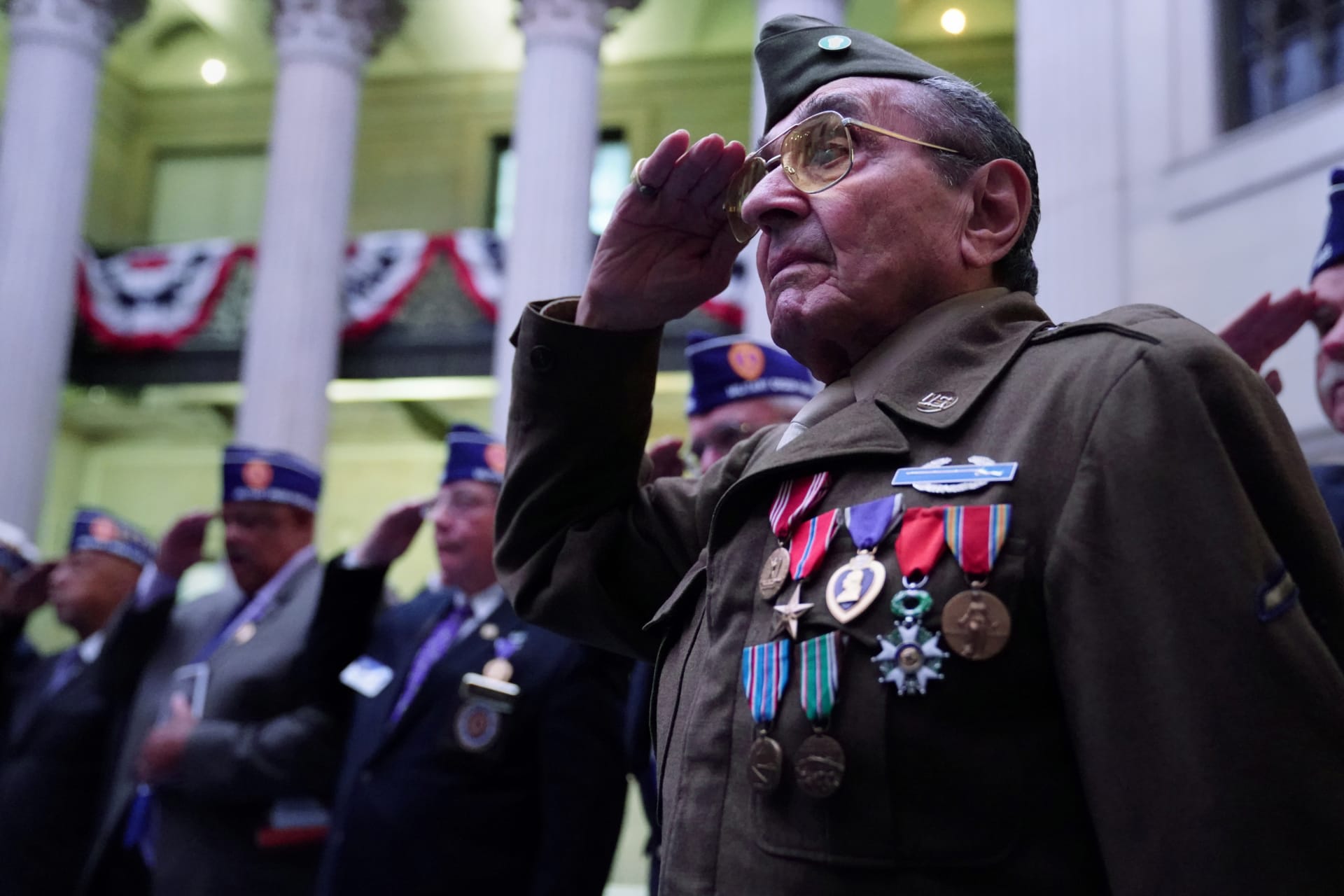 <p>World War II veterans salute during a Purple Heart Reunification ceremony in New York City on August 7, 2017. Carlo Allegri/REUTERS</p>
