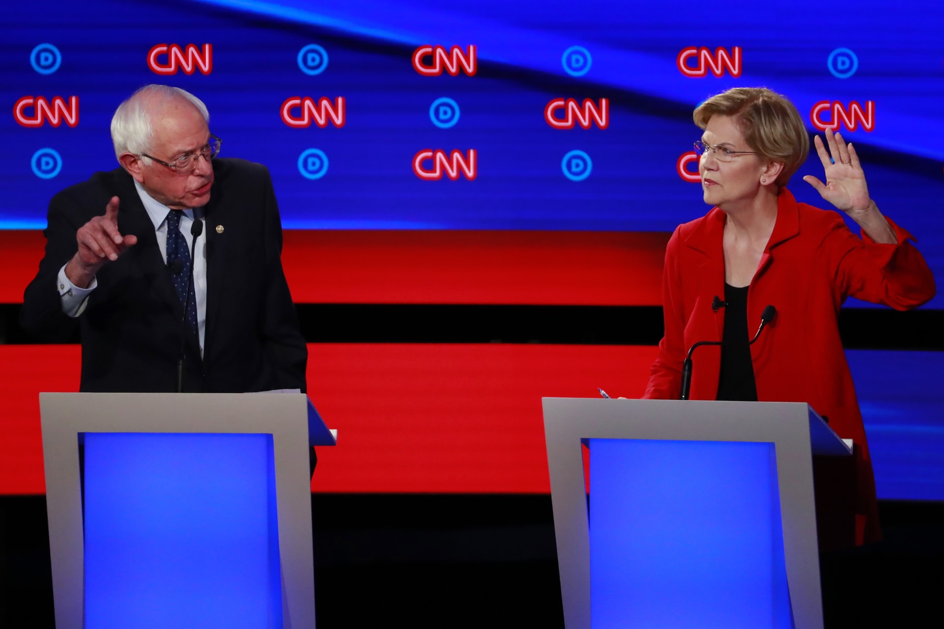 <p>U.S. Senator Bernie Sanders and U.S. Senator Elizabeth Warren participate in the first night of the second 2020 Democratic U.S. presidential debate in Detroit, Michigan, on July 30, 2019.</p>
