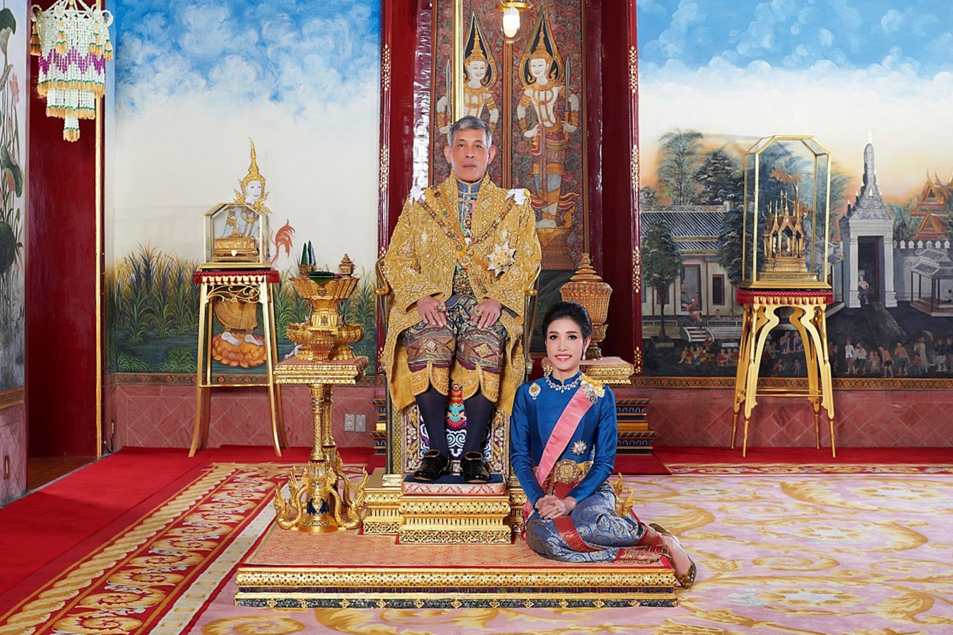 <p>Thailand’s King Maha Vajiralongkorn and General Sineenat Wongvajirapakdi, the royal consort, pose at the Grand Palace in Bangkok, Thailand, in this undated handout photo obtained by Reuters on August 27, 2019.</p>