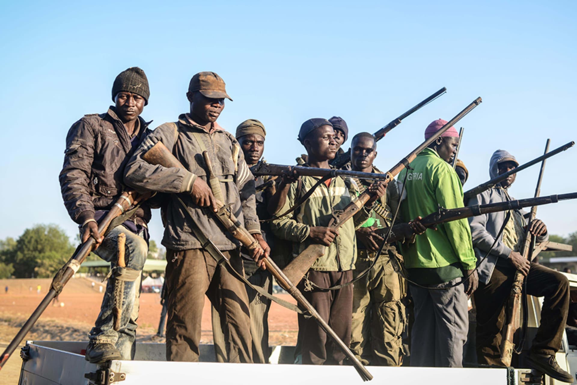 <p> Local hunters armed with locally made guns in Yola city of Adamawa State in Nigeria before they move to border region between Nigeria and Cameroon to support Nigerian army fighting Boko Haram militants on December 06, 2014.</p>
