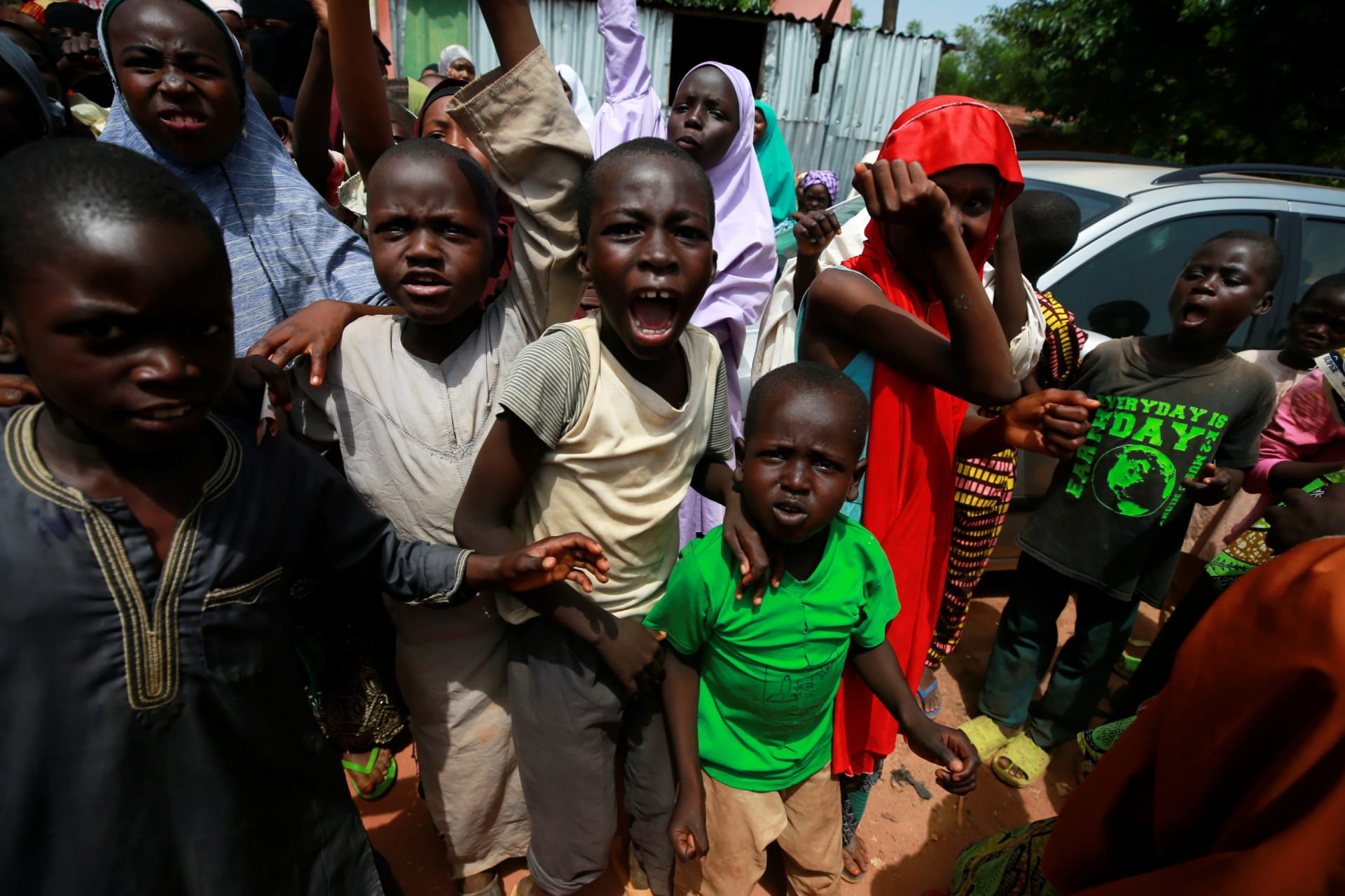 <p>Children protest outside the building where hundreds of men and boys were rescued from captivity by police in Kaduna, Nigeria, on September 28, 2019. </p>
