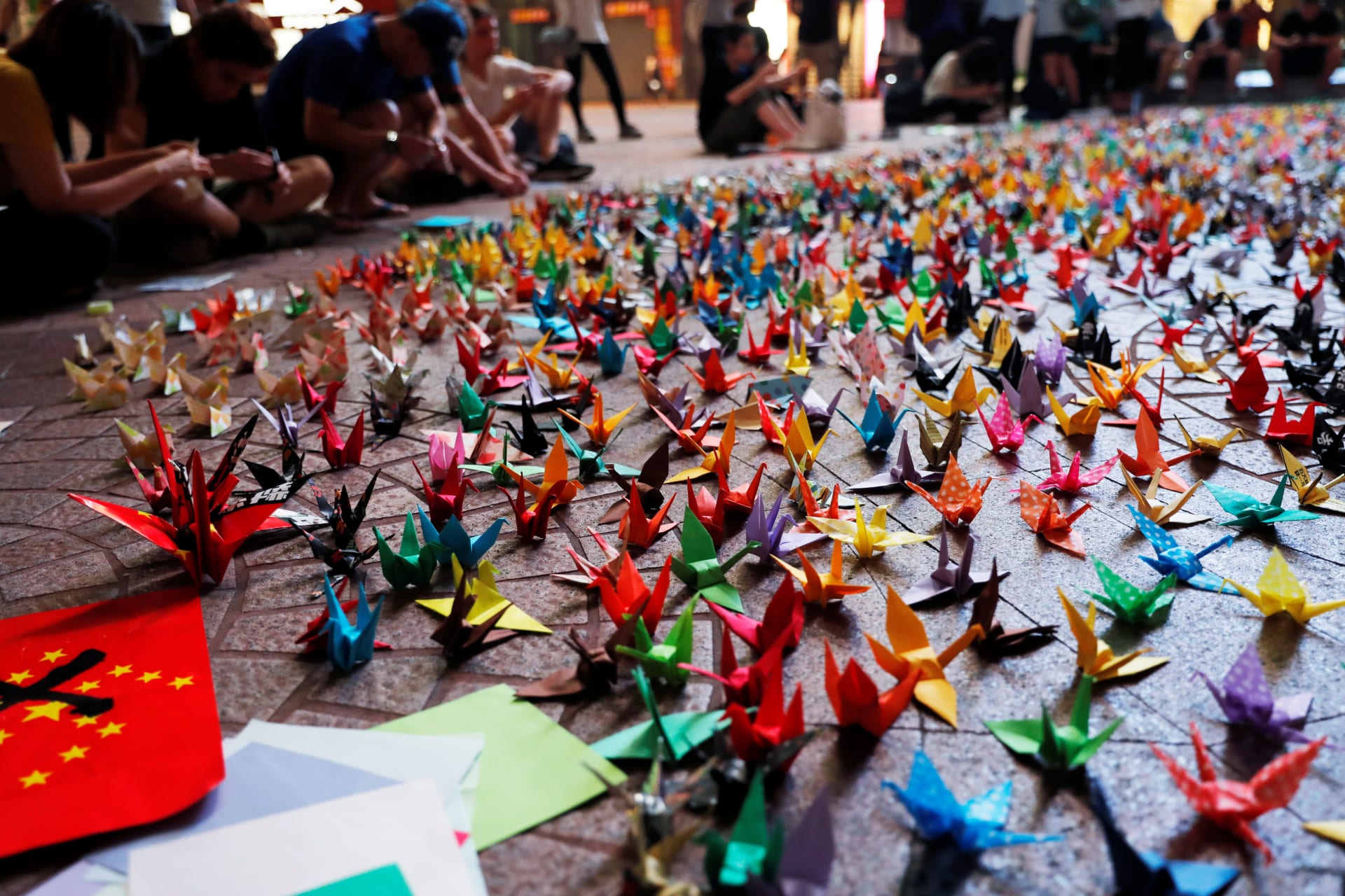 <p>Thousands of paper cranes are folded by anti-government protesters to call for political reforms in Hong Kong on September 29, 2019.</p>
