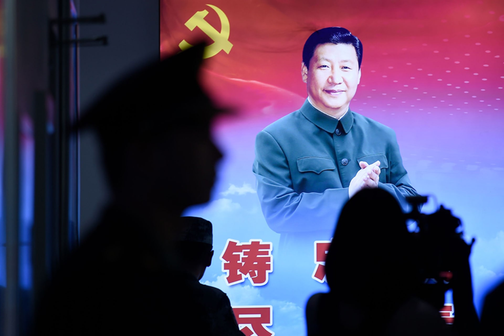 <p>A portrait of President Xi Jinping hangs in Beijing ahead of the seventieth anniversary of the People’s Republic of China. </p>
