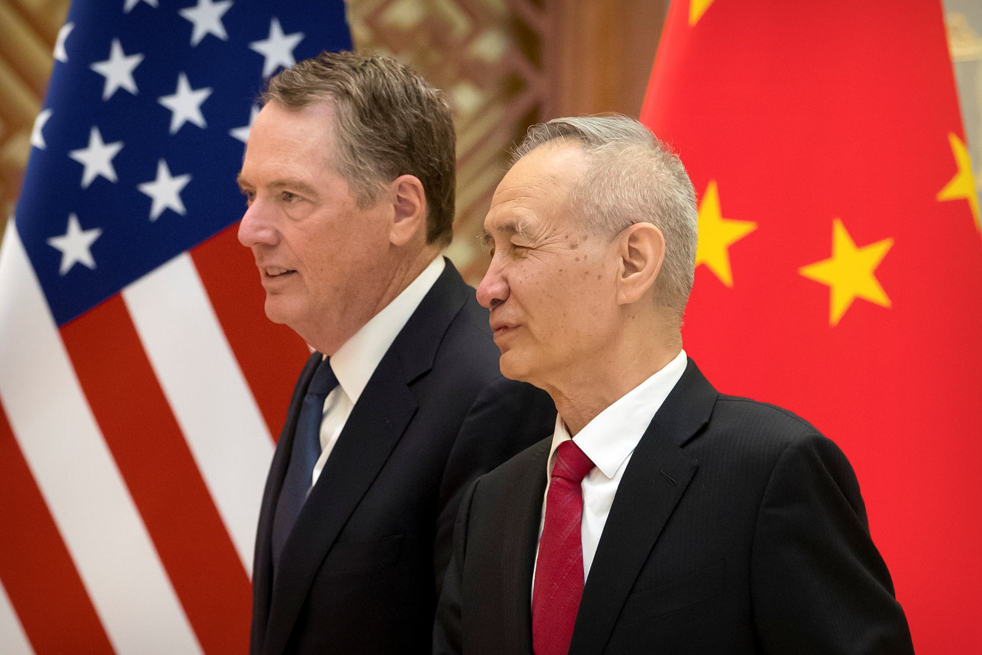 <p>U.S. Trade Representative Robert Lighthizer, left, and Chinese Vice Premier Liu He arrive for a group photo at the Diaoyutai State Guesthouse in Beijing, China February 15, 2019.</p>
