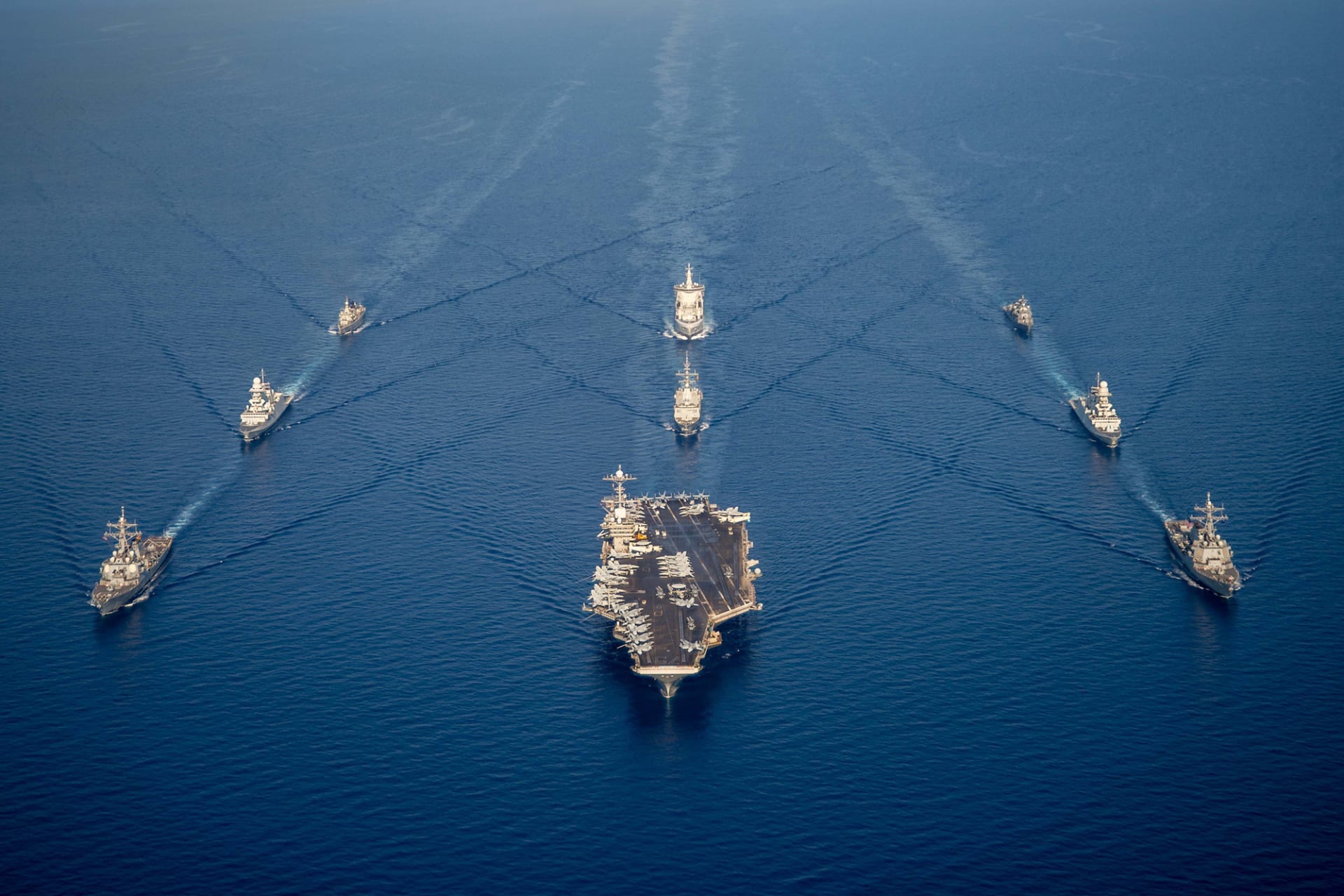 <p>Ships from Standing NATO Maritime Group 2 sail in formation in the Mediterranean Sea.</p>
