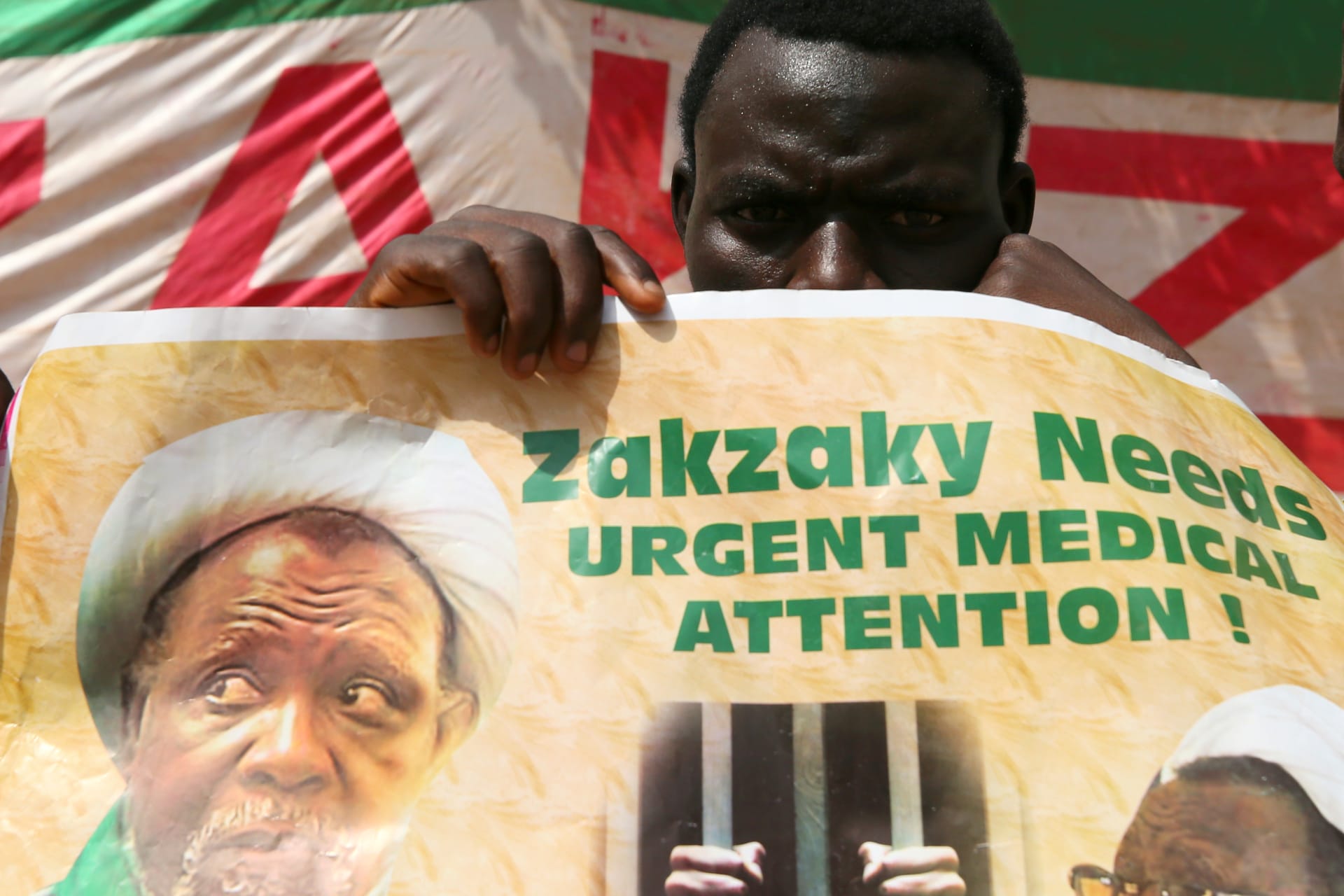 <p>A protester holds a banner calling for the release of Sheikh Ibrahim Zakzaky, the leader of the Islamic Movement of Nigeria (IMN), in Abuja, Nigeria, on January 26, 2018. </p>
