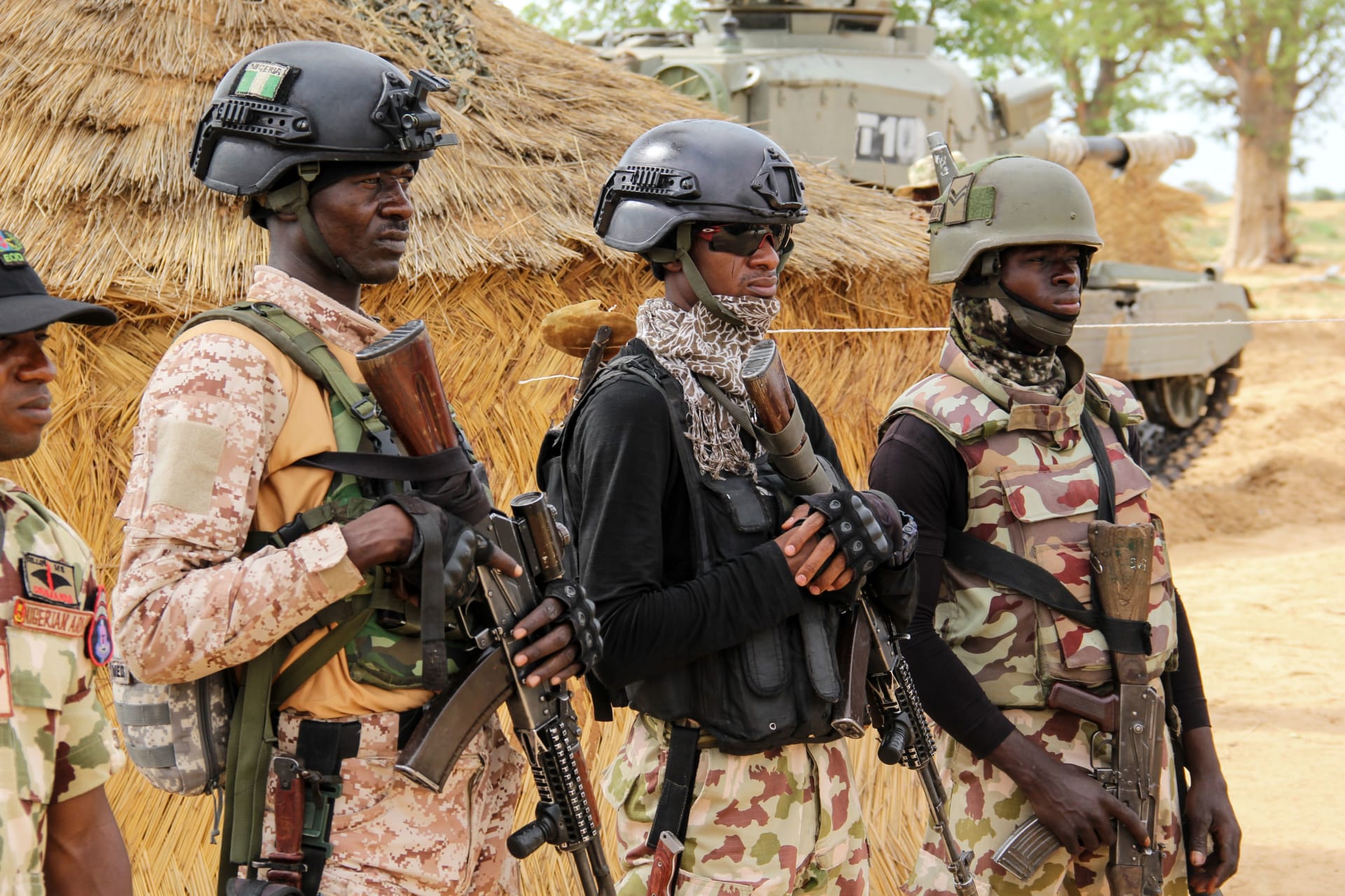 <p>Nigerian Army soldiers stand at a base in Baga, Nigeria, on August 2, 2019. </p>