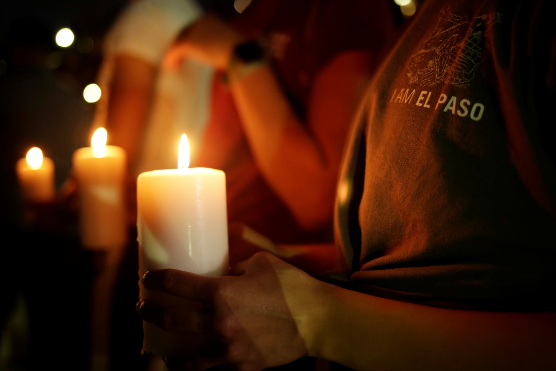 <p>Mourners take part in a vigil at El Paso High School after a mass shooting at a Walmart store in El Paso, Texas, U.S. August 3, 2019.</p>
