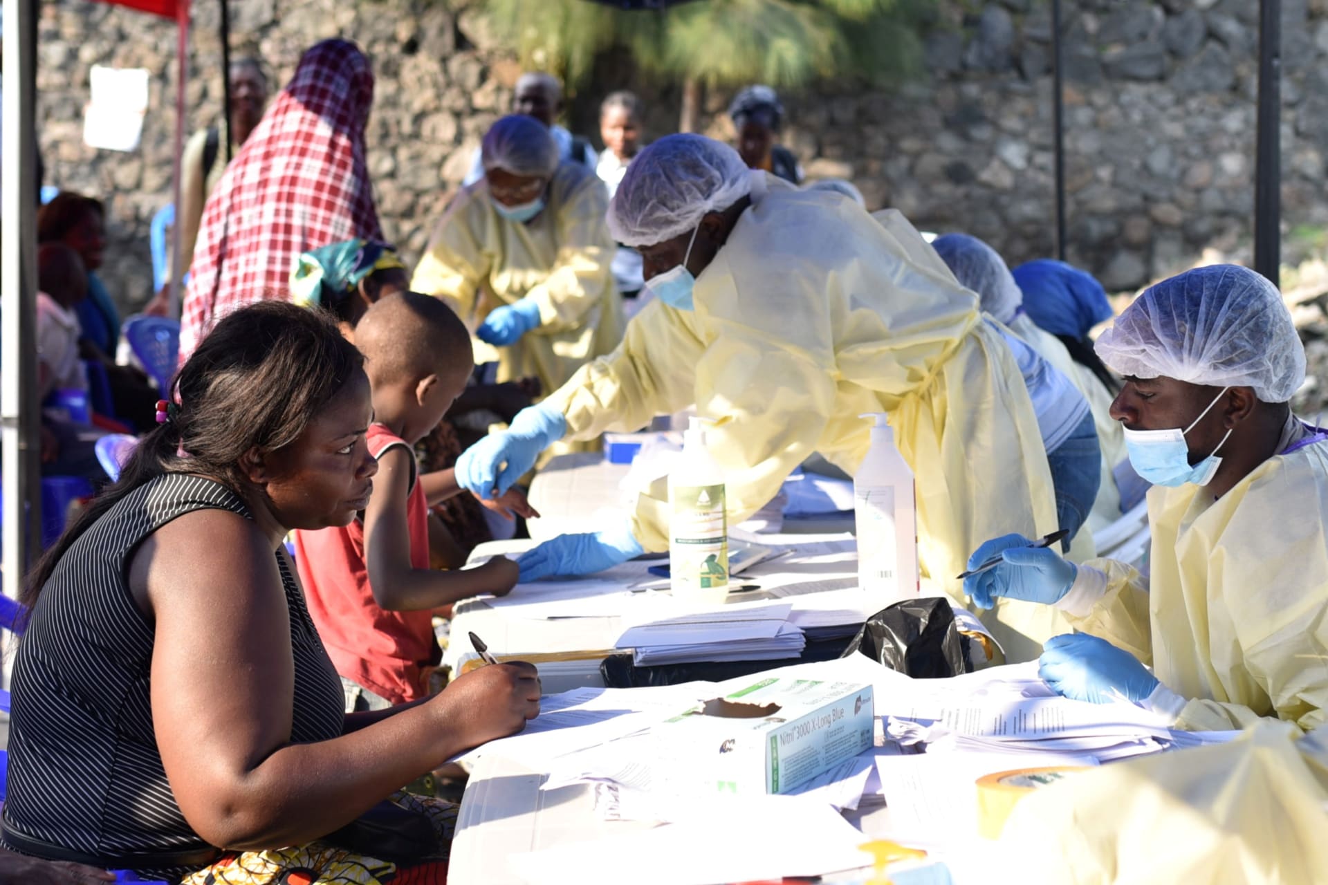 <p>Congolese health workers collect data before administering ebola vaccines to civilians at the Himbi Health Centre in Goma, Democratic Republic of Congo, on July 17, 2019.</p>