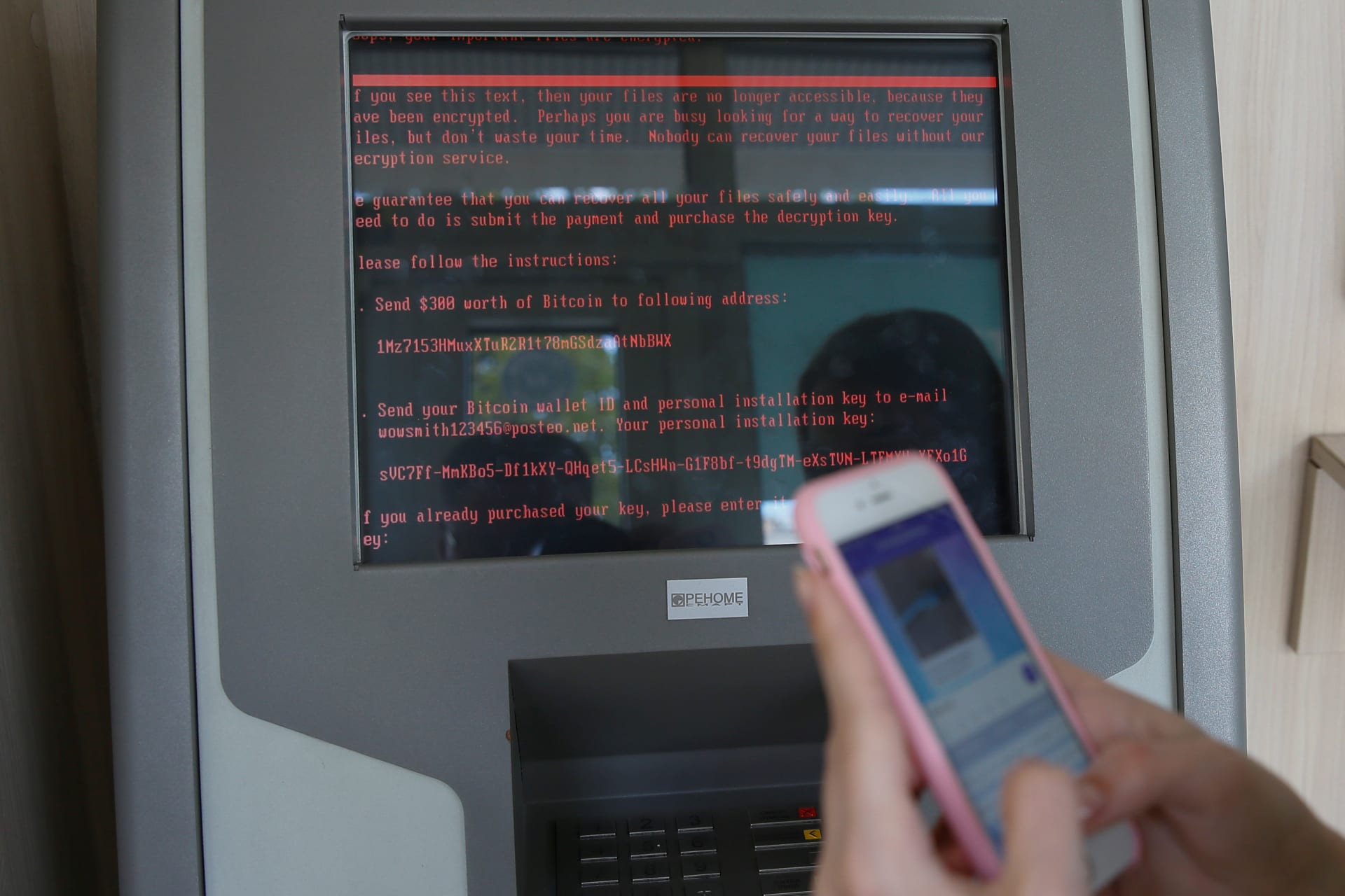 <p>A message demanding money is seen on a monitor of a payment terminal at a branch of Ukraine’s state-owned bank Oschadbank after Ukrainian institutions were hit by a wave of cyber attacks earlier in the day, in Kiev, Ukraine, June 27, 2017. </p>
