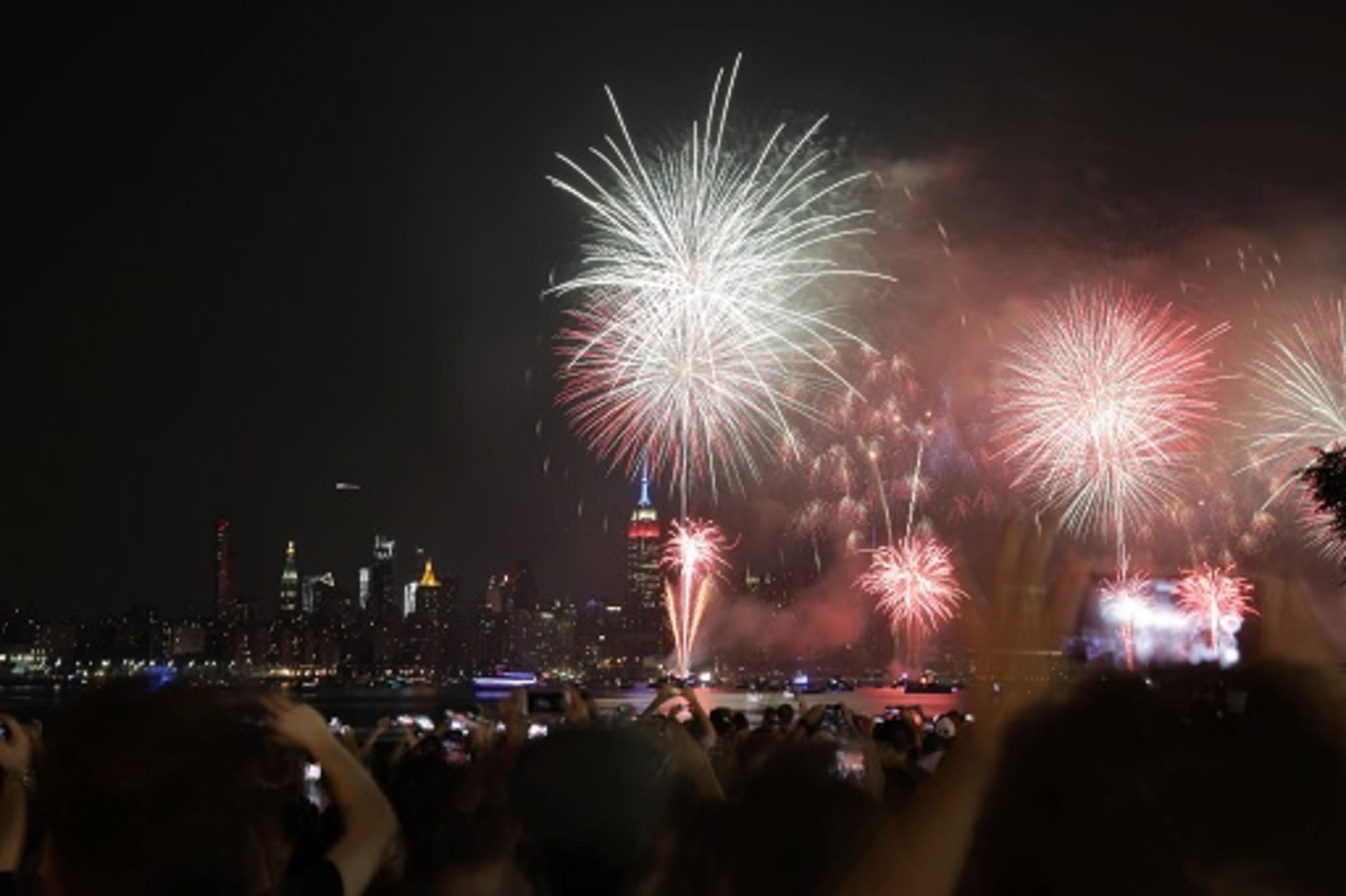 <p>People gather to watch fireworks at the East River State Park in Williamsburg, Brooklyn. </p>