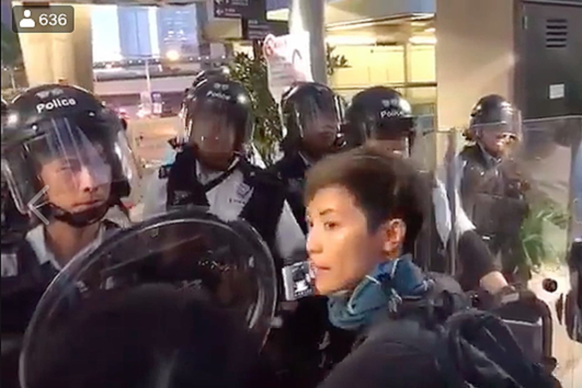 <p>Hong Kong democracy activist Denise Ho live-streaming protest clashes with police on Facebook.</p>
