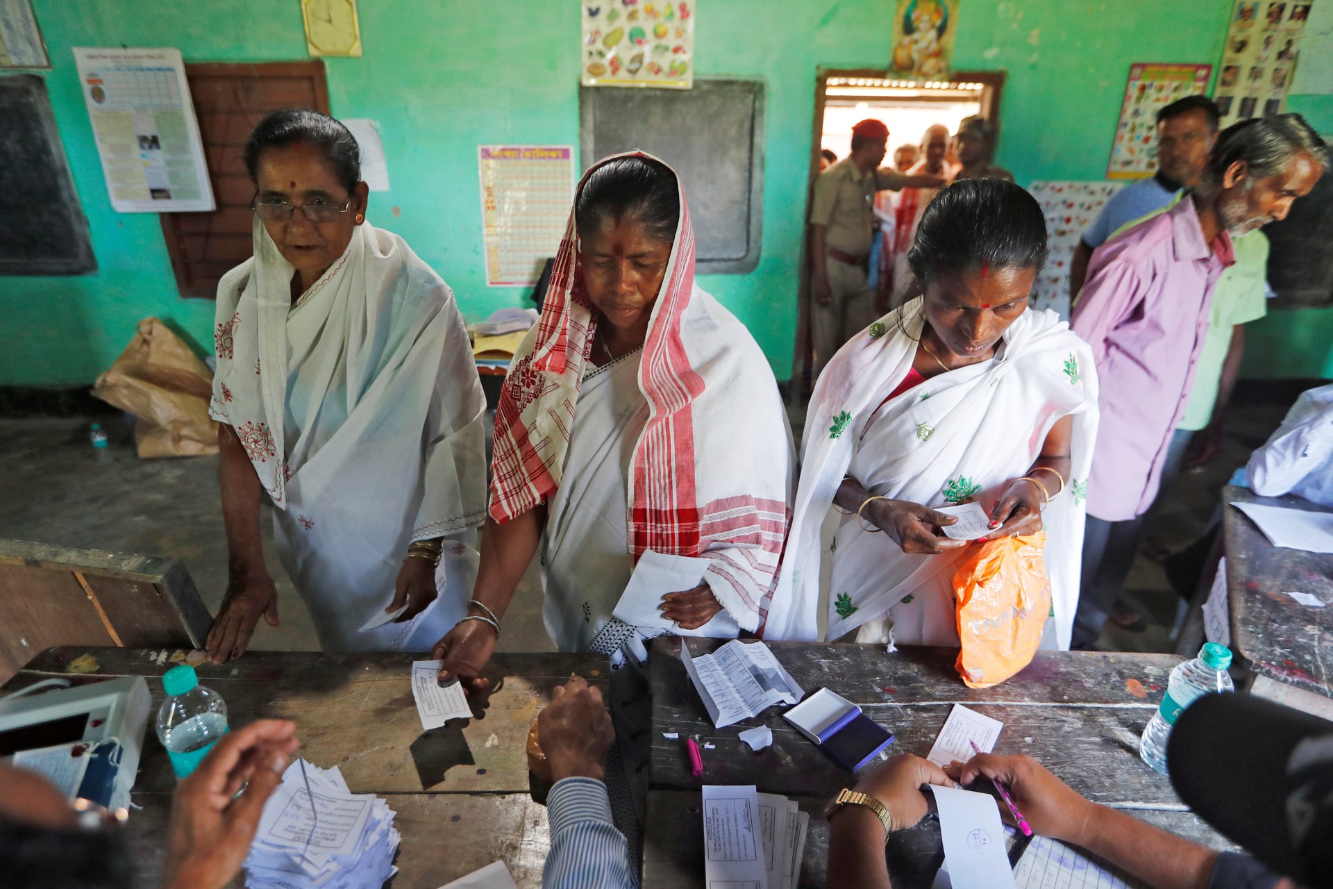 <p>Women at a polling station during the first phase of general election in the northeastern Indian state of Assam, 2019. </p>
