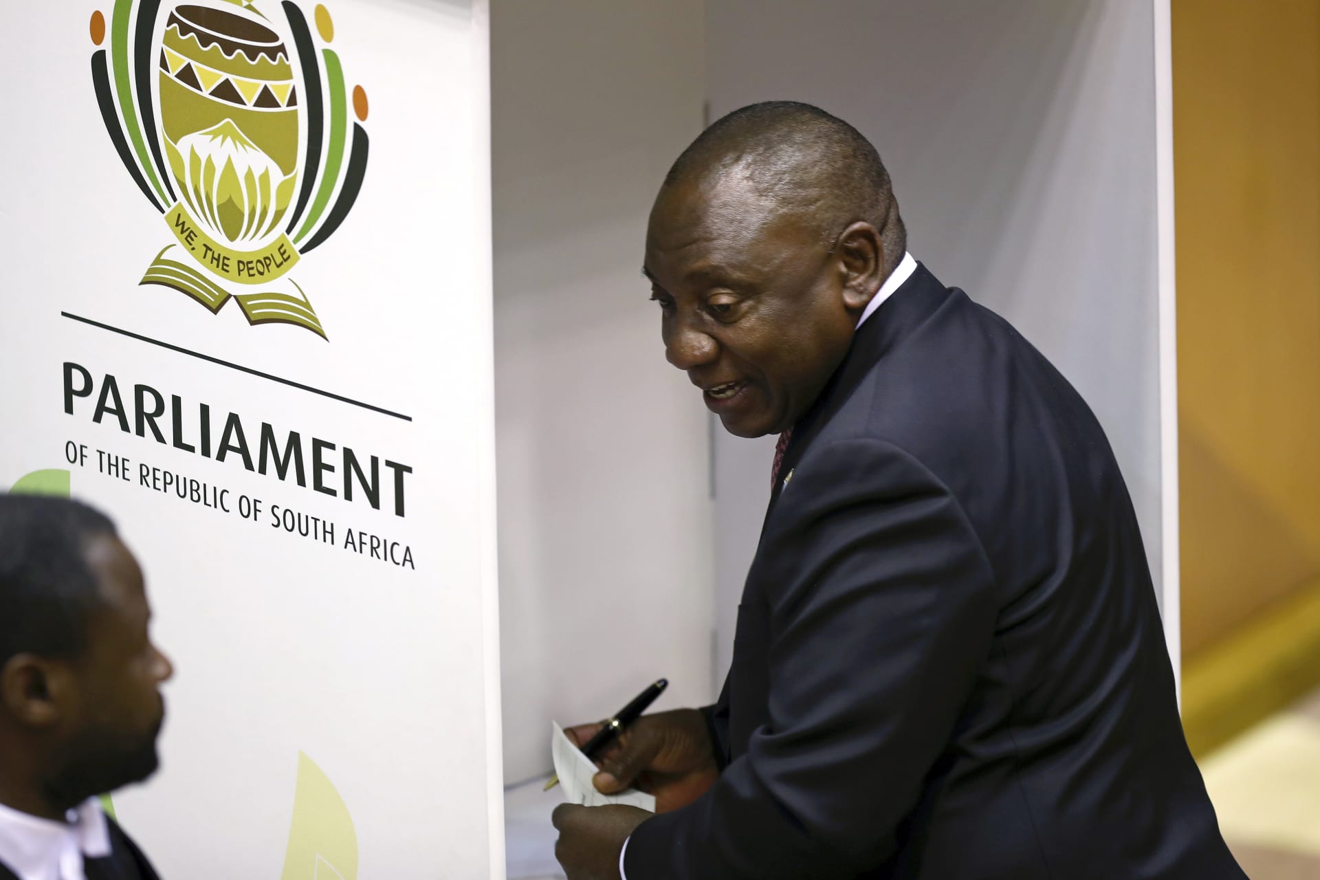 <p>President Cyril Ramaphosa casts his vote for the speaker of the National Assembly at the parliament in Cape Town, South Africa, on May 22, 2019.</p>
