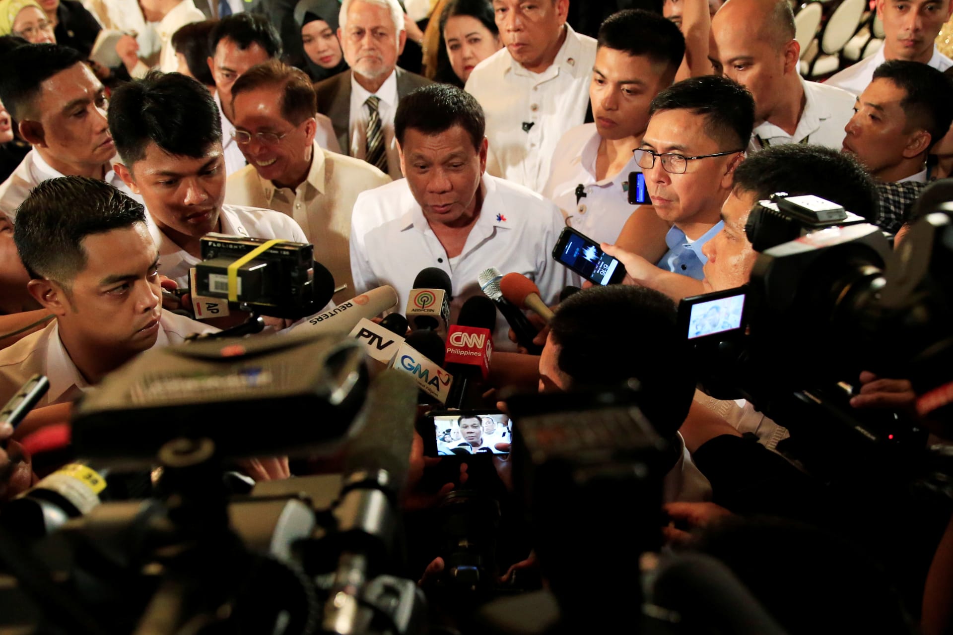 <p>Philippine President Rodrigo Duterte is interviewed by reporters after the handover of a draft law of the Bangsamoro Basic Law (BBL) in a ceremony at the Malacanang presidential palace in metro Manila, Philippines on July 17, 2017.</p>
