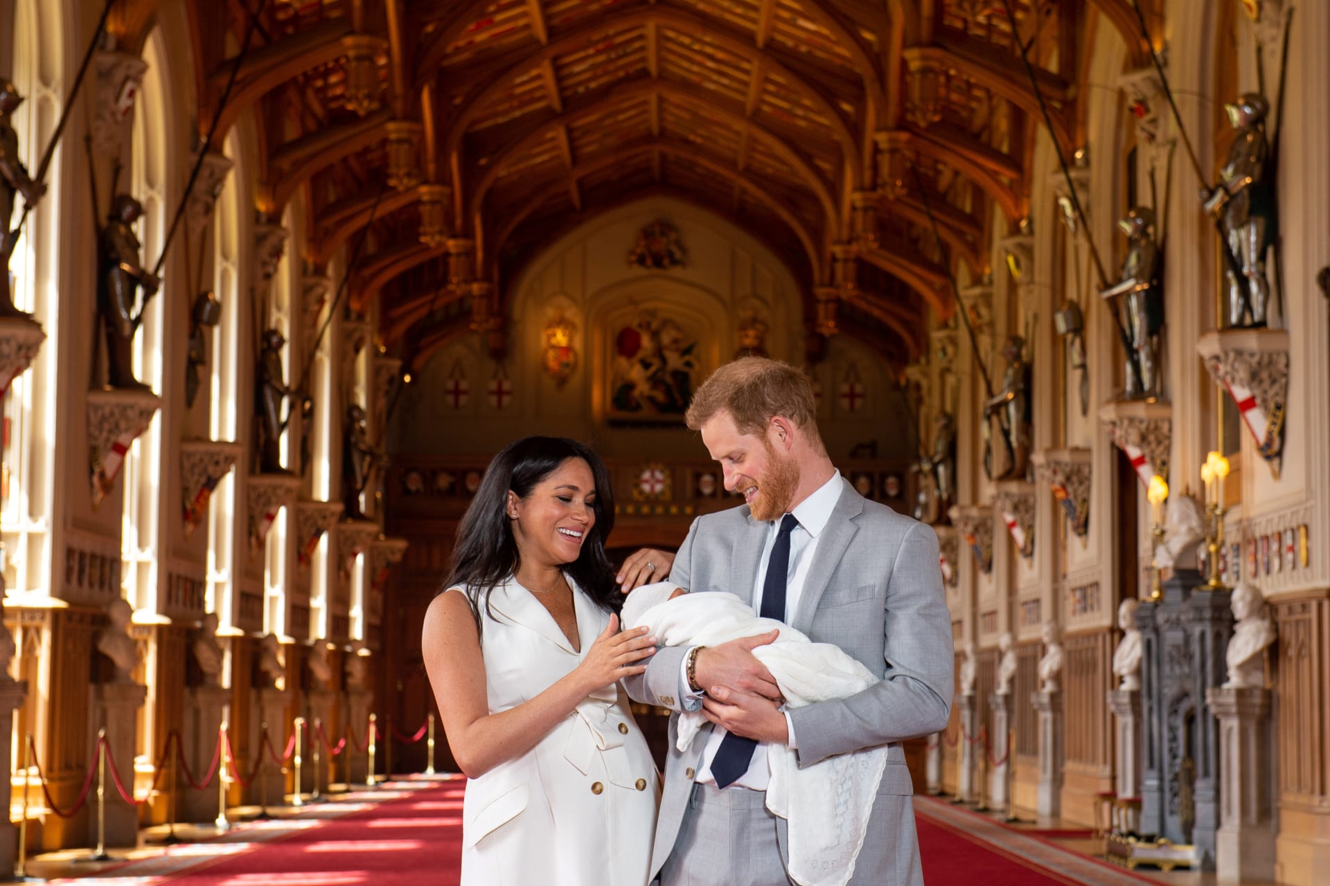 <p>Britain’s Prince Harry and Meghan, duchess of Sussex, are seen with their baby son, who was born on Monday morning, during a photocall in St George’s Hall at Windsor Castle, in Berkshire, Britain May 8, 2019.</p>
